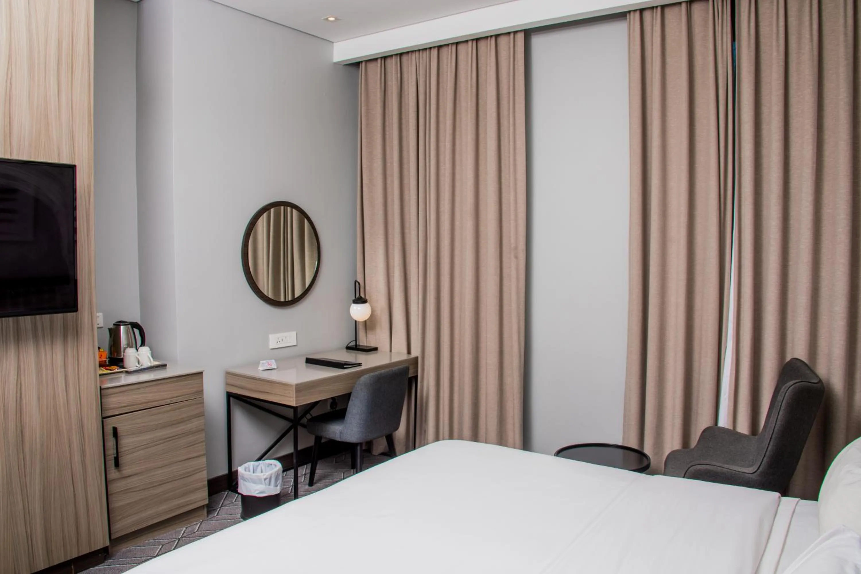 Seating area, Bed in Radisson Lagos Ikeja