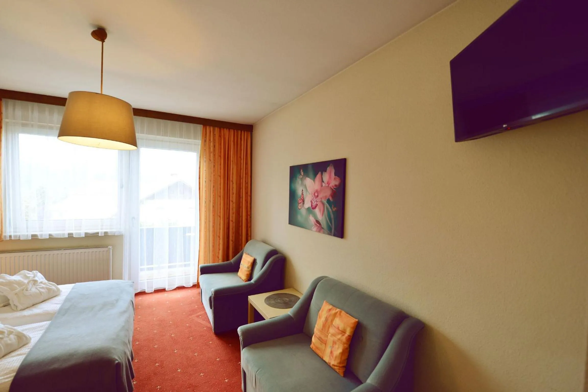 Seating area, Bed in Gasthof-Pension Golob