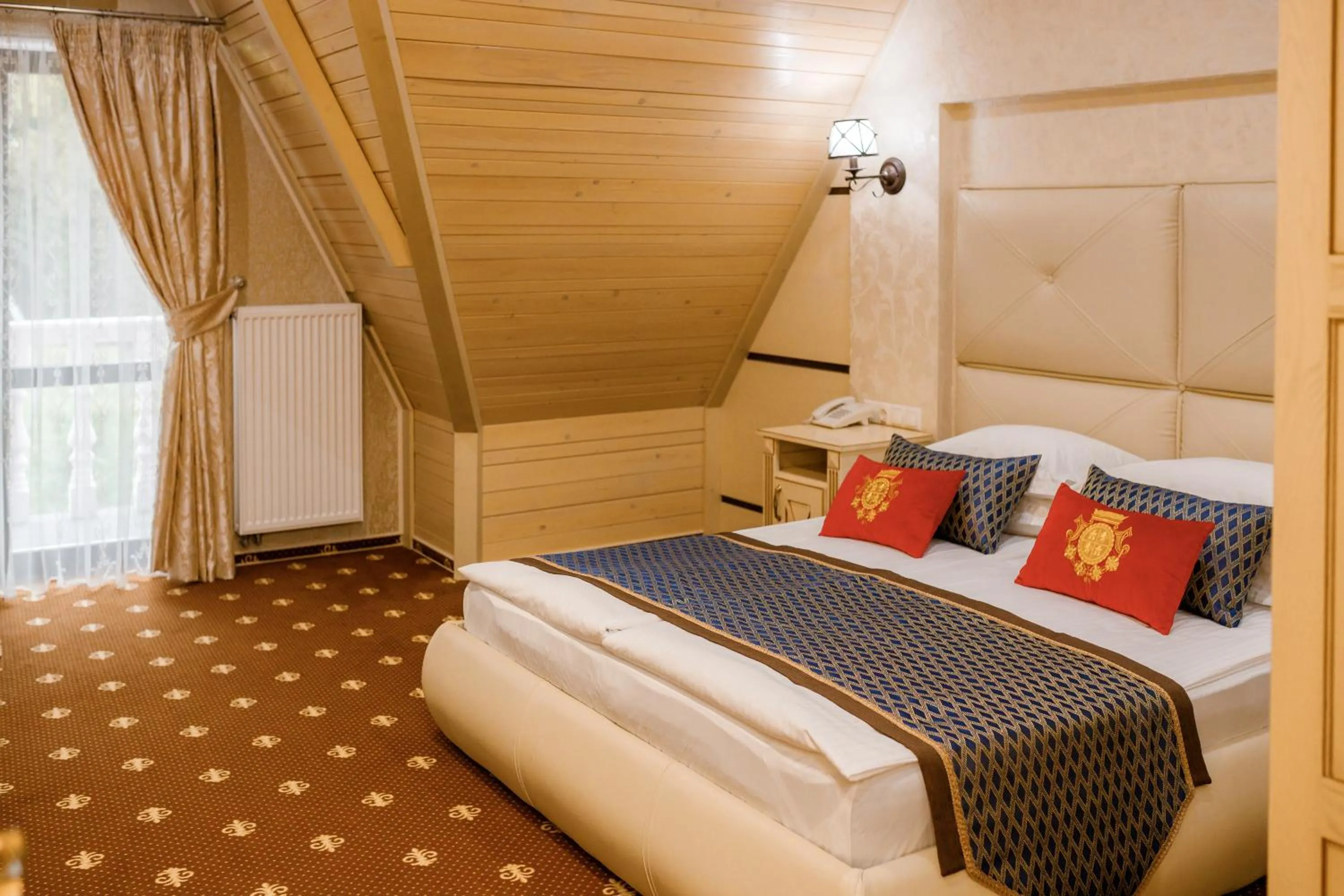 Bed in Chevalier Hotel & SPA