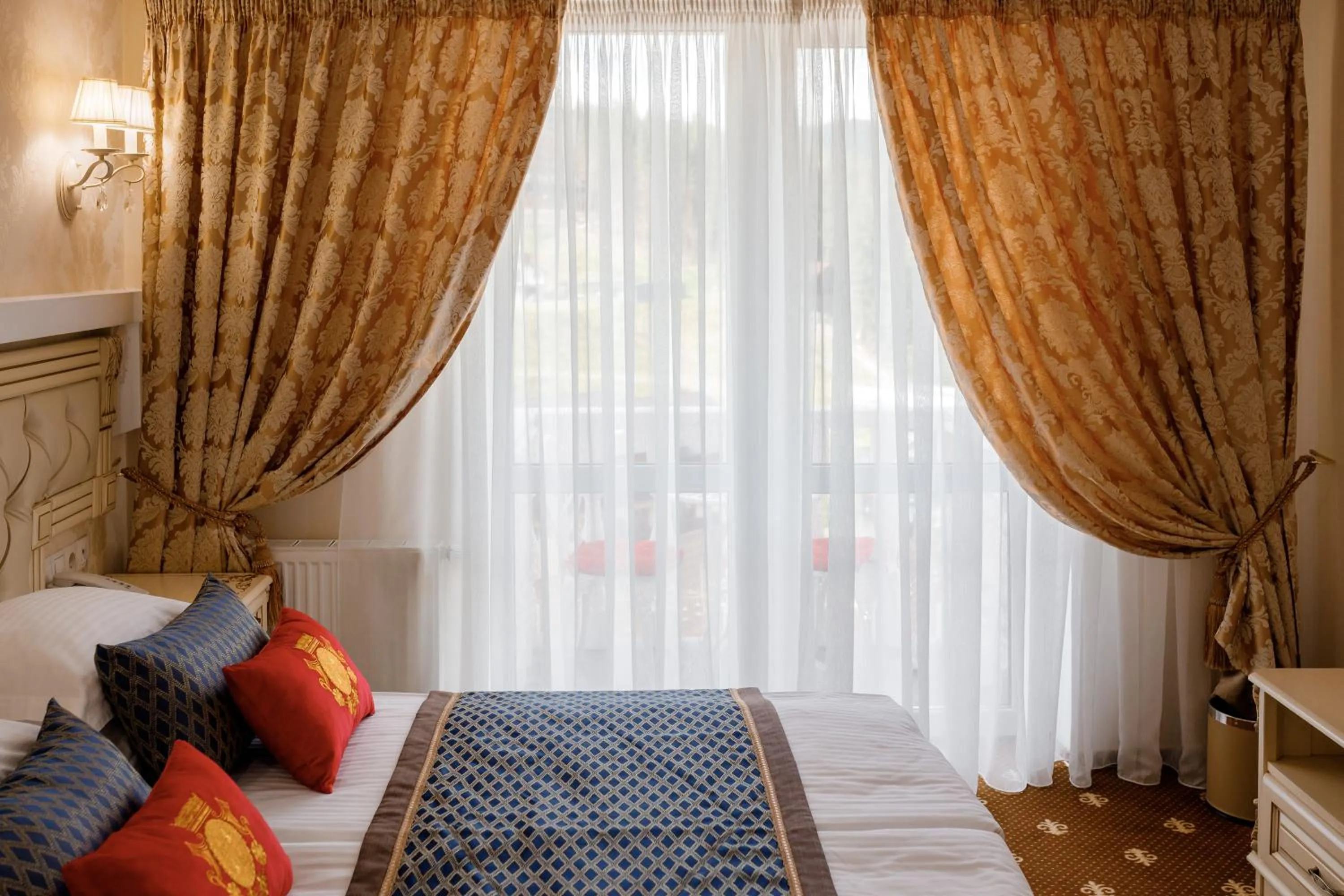 Bed in Chevalier Hotel & SPA