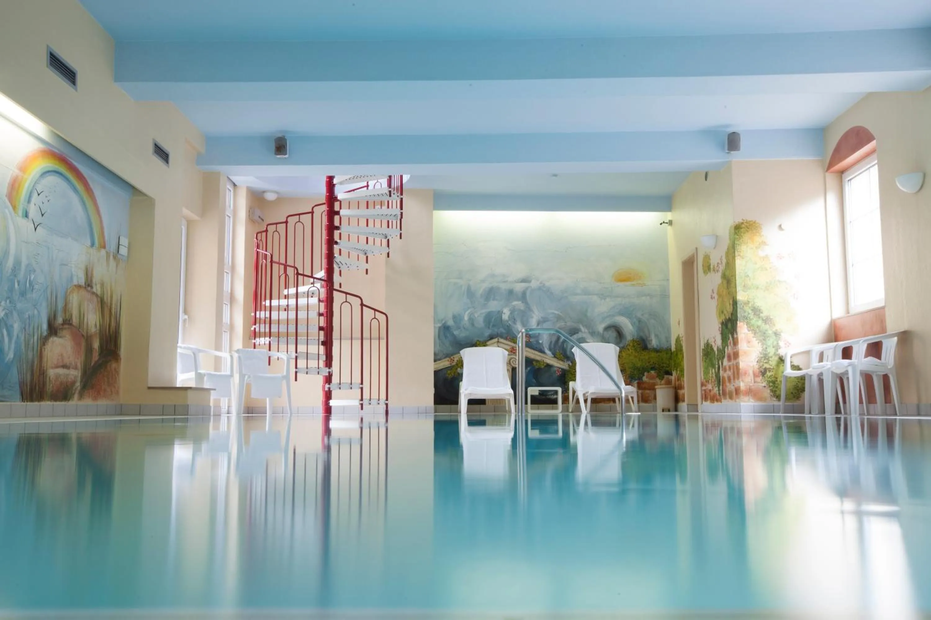 Swimming pool in Hotel du Commerce - Restaurant La Table de Clervaux