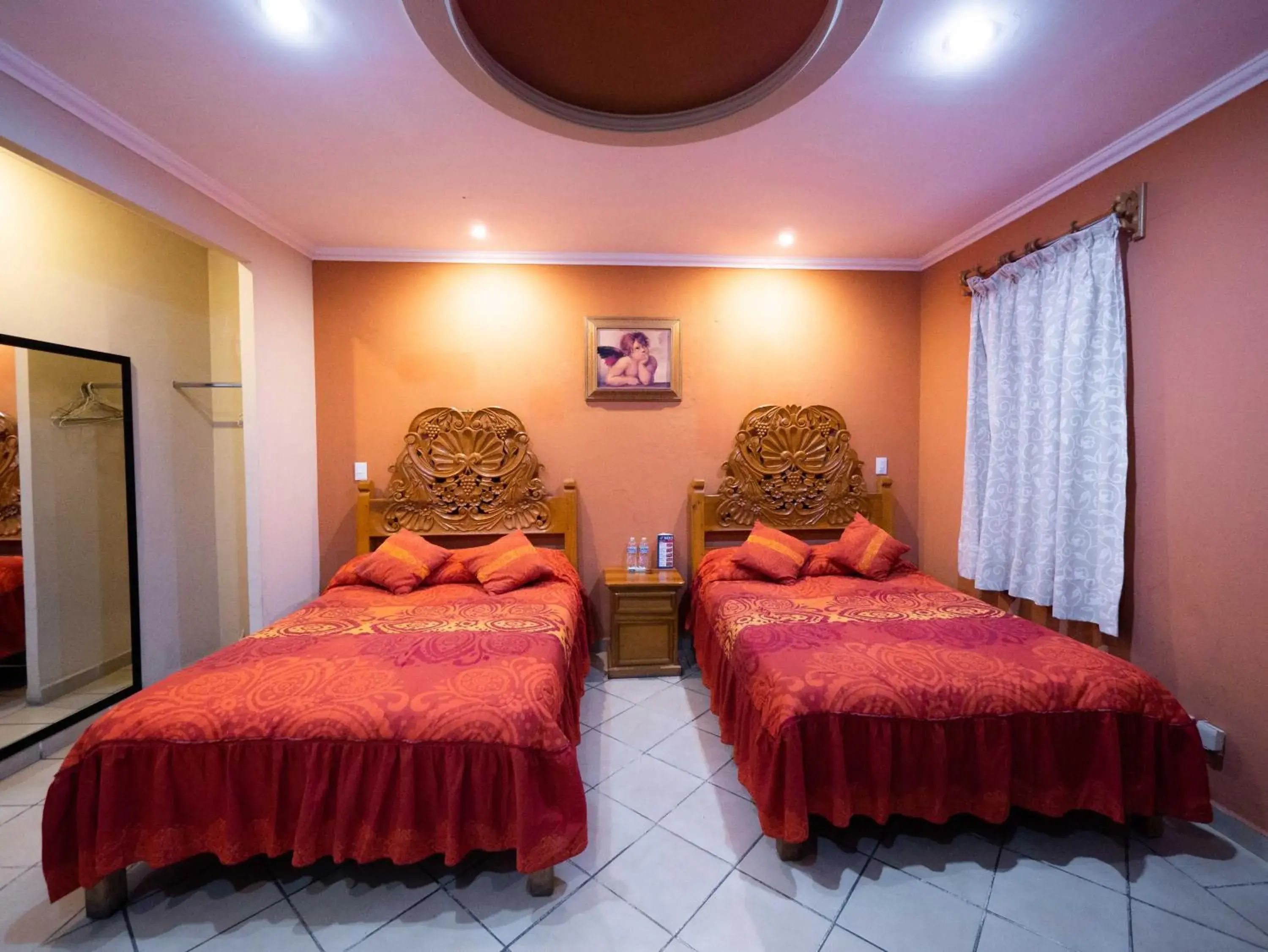 Quadruple Room in Hotel el Ángel Taxco Quadruple Room in Hotel el Ángel Taxco