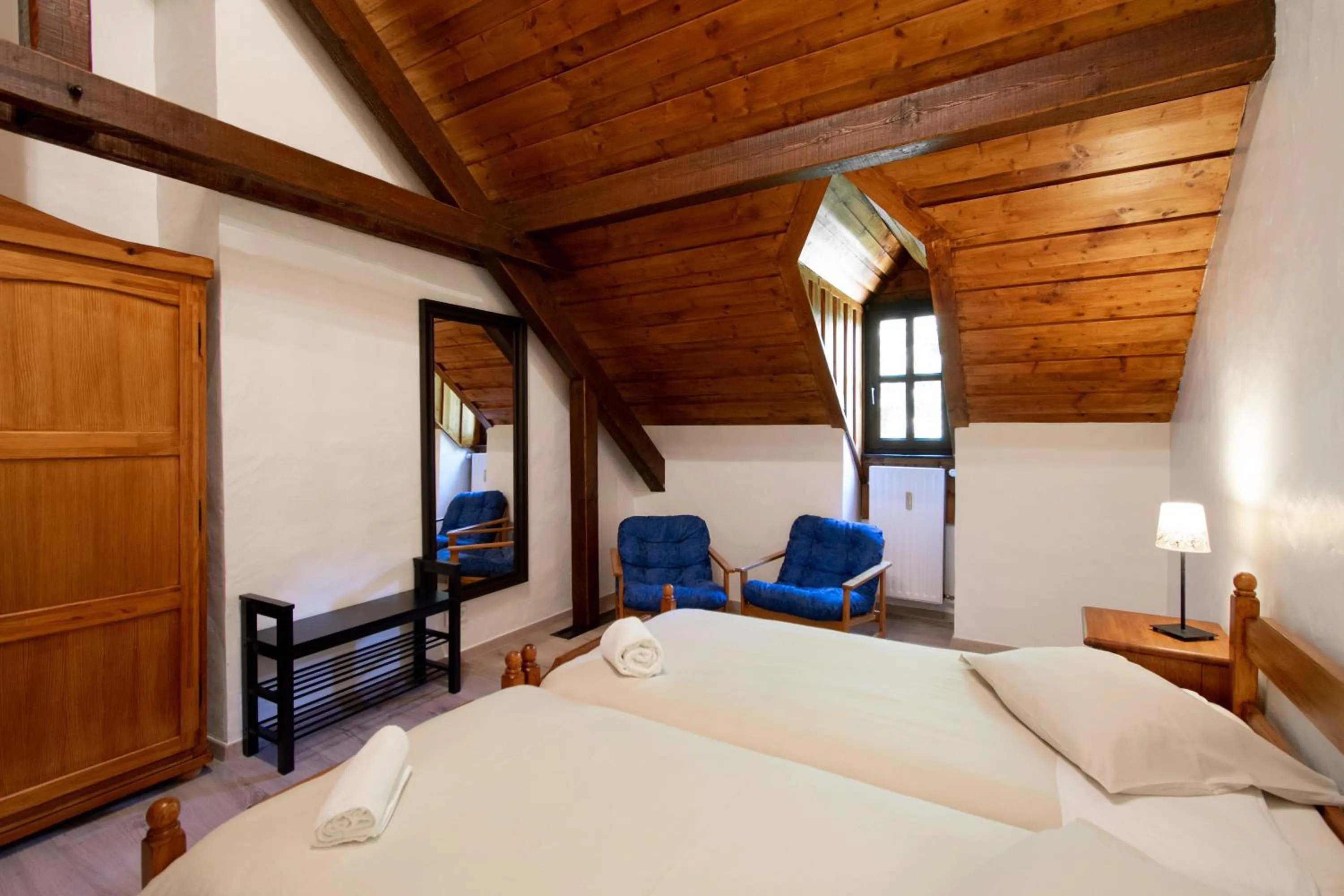 Photo of the whole room, Bed in Domaine du Moulin d'Asselborn