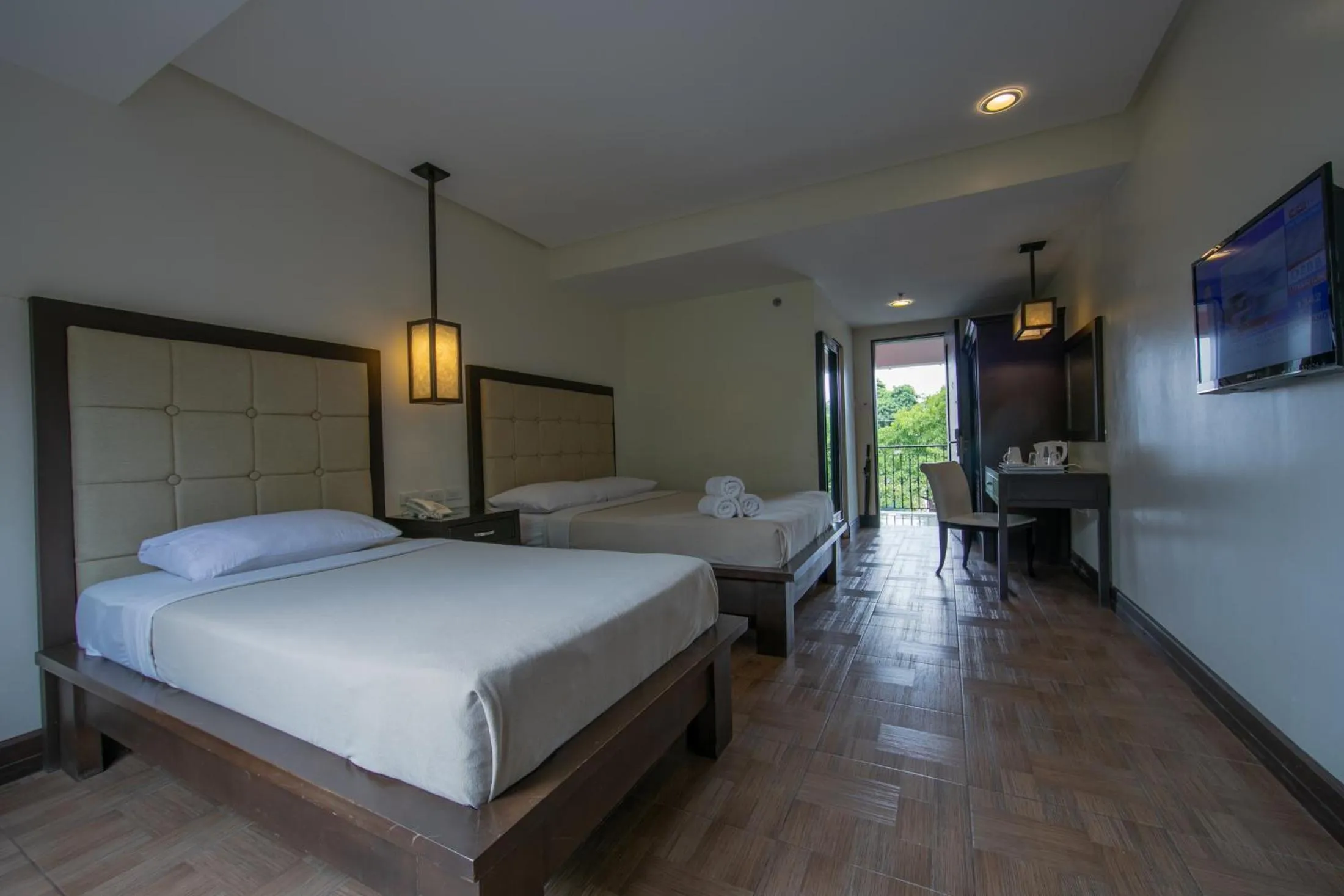 Bed in Rosvenil Hotel