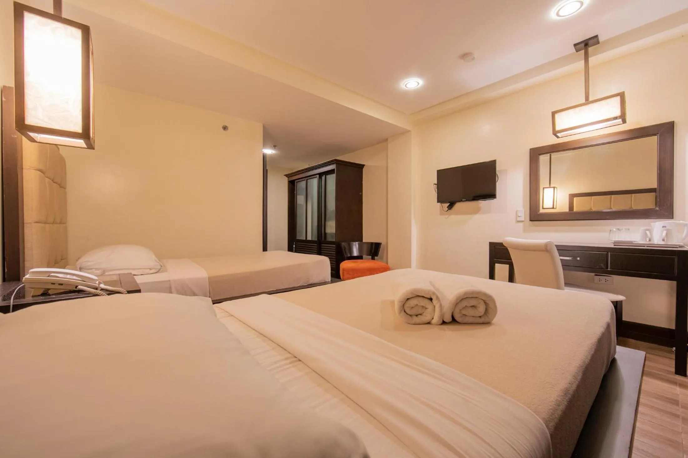 Bed in Rosvenil Hotel