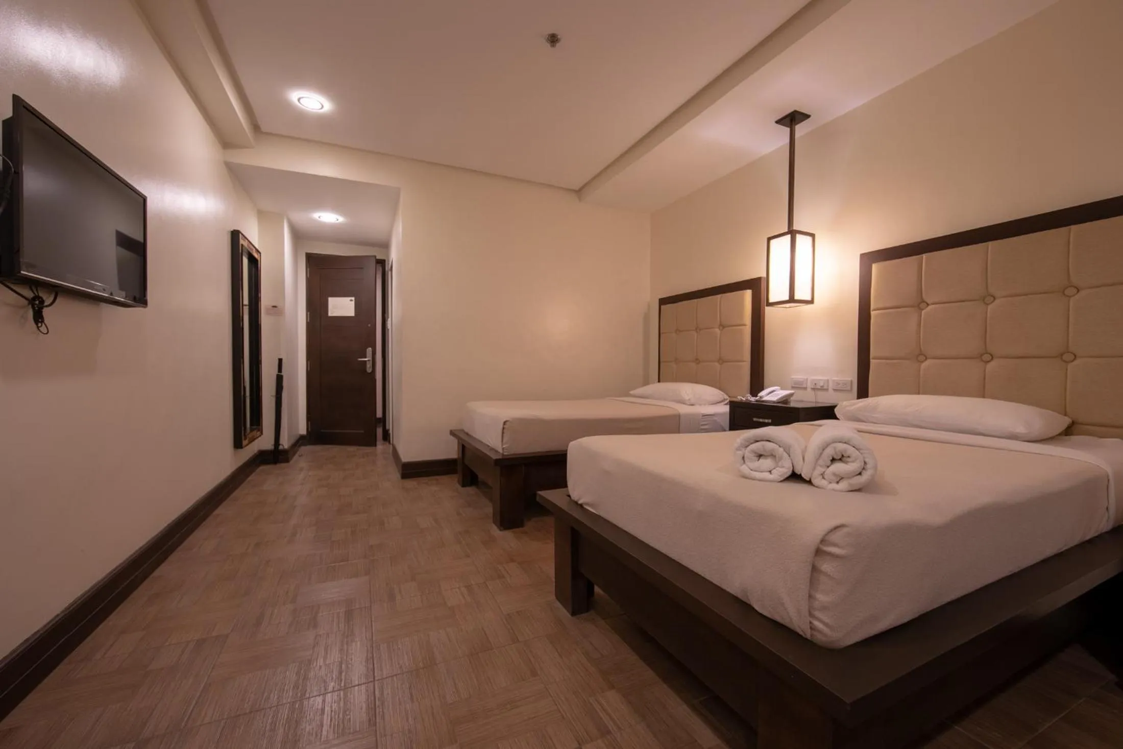 Bed in Rosvenil Hotel