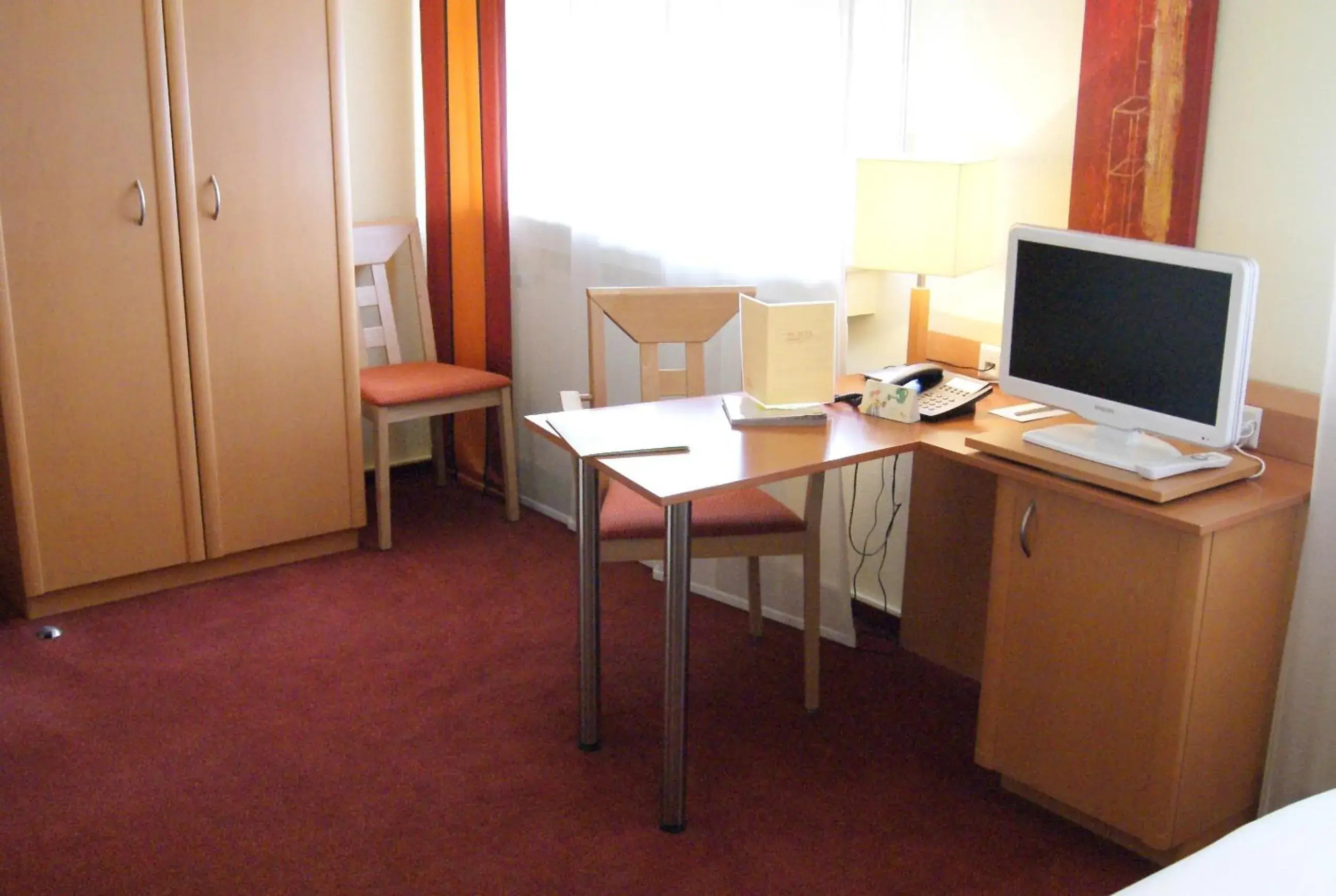 Seating area, Bed in Logis Hôtel Acacia Seating area, Bed in Logis Hôtel Acacia