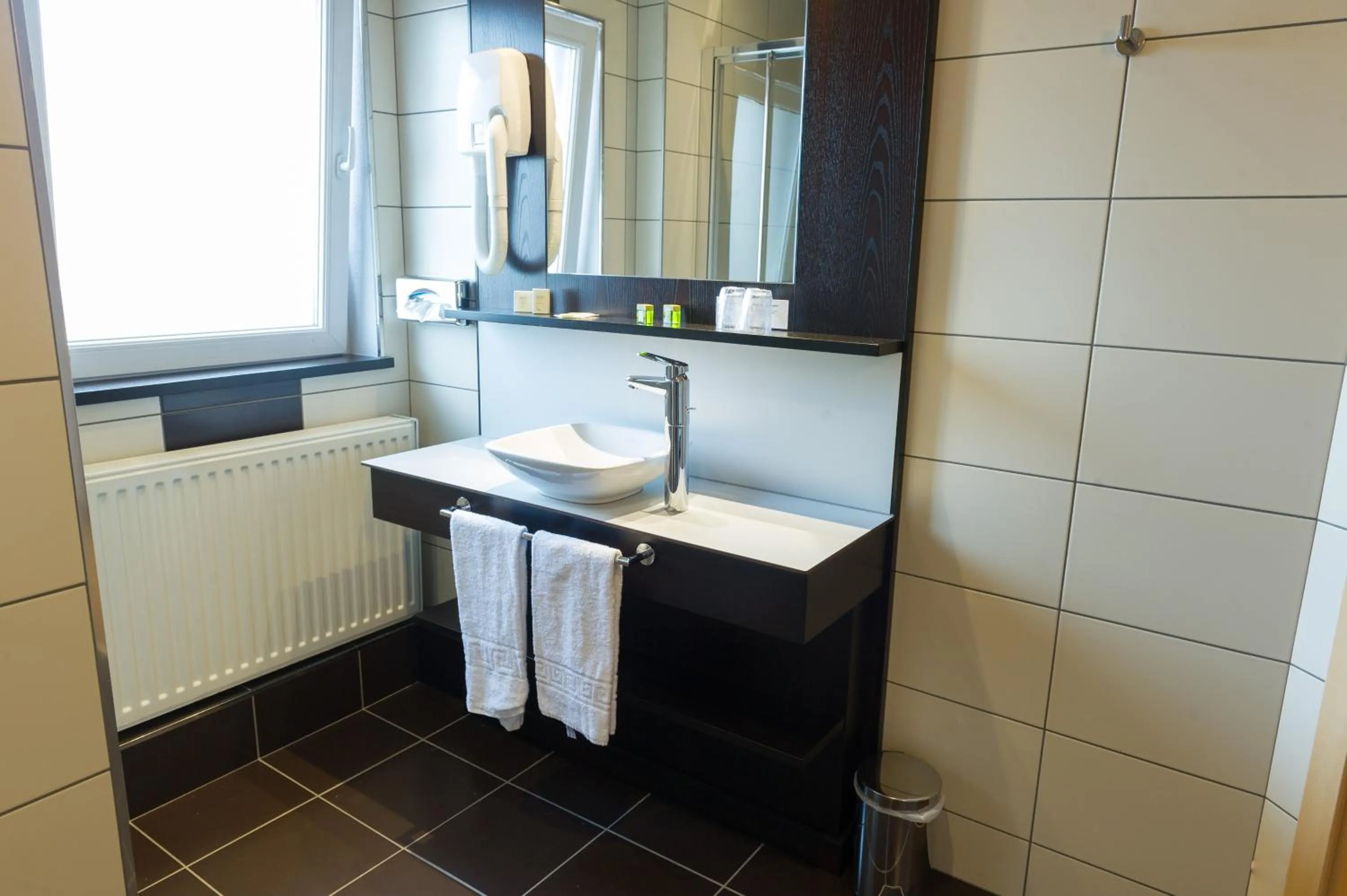 Toilet in Cottage Logis Hôtel - Restaurant