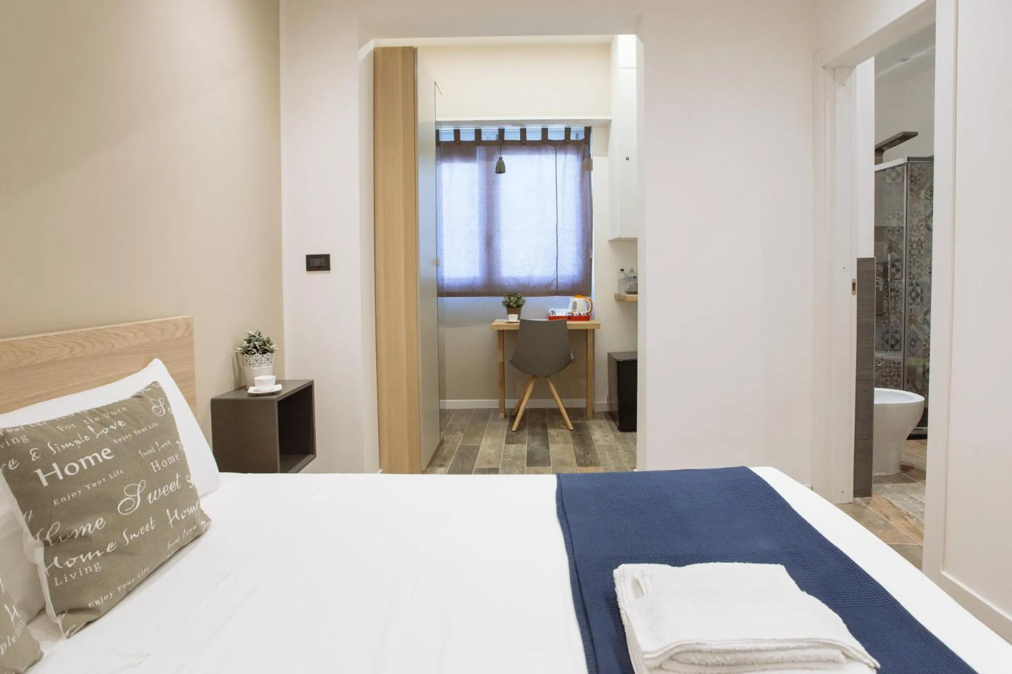 Bed in Politeama Luxury Suites