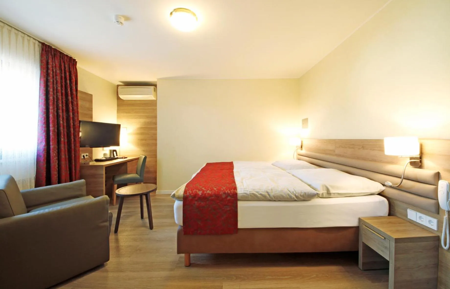 Bed in Hotel Saint Fiacre