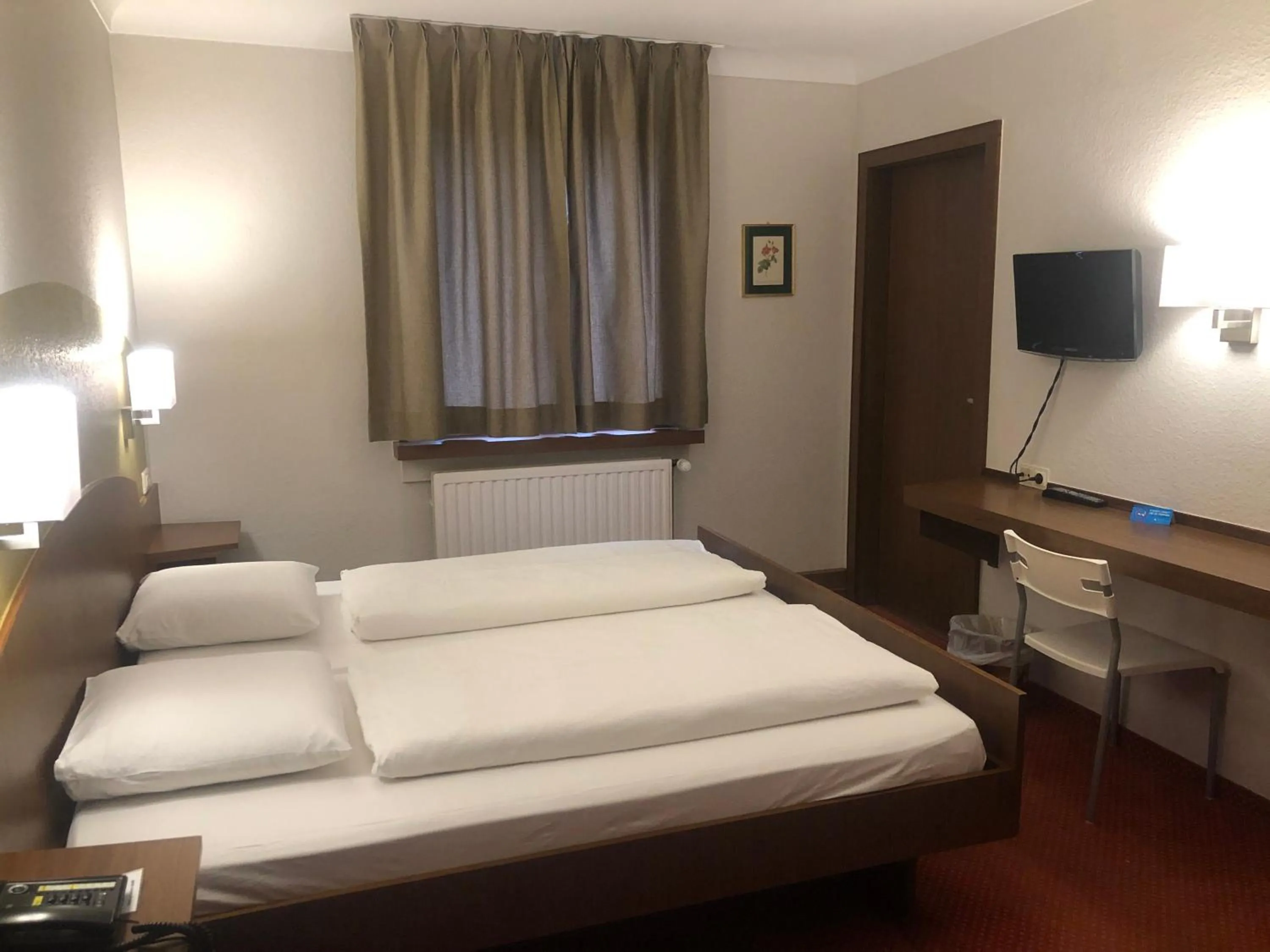 Bed in Hotel du Parc