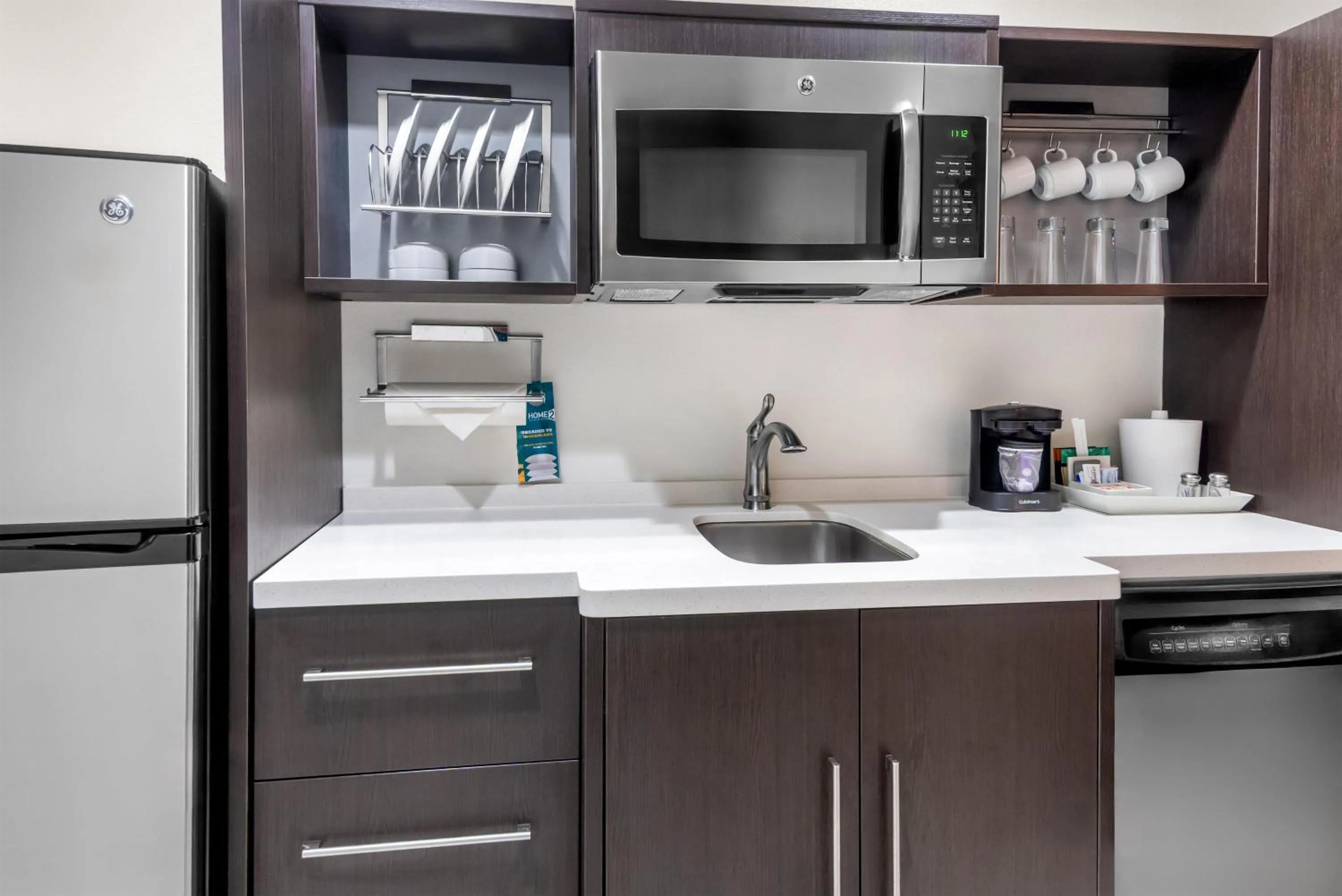 Kitchen or kitchenette in Home2 Suites By Hilton Dallas Grand Prairie