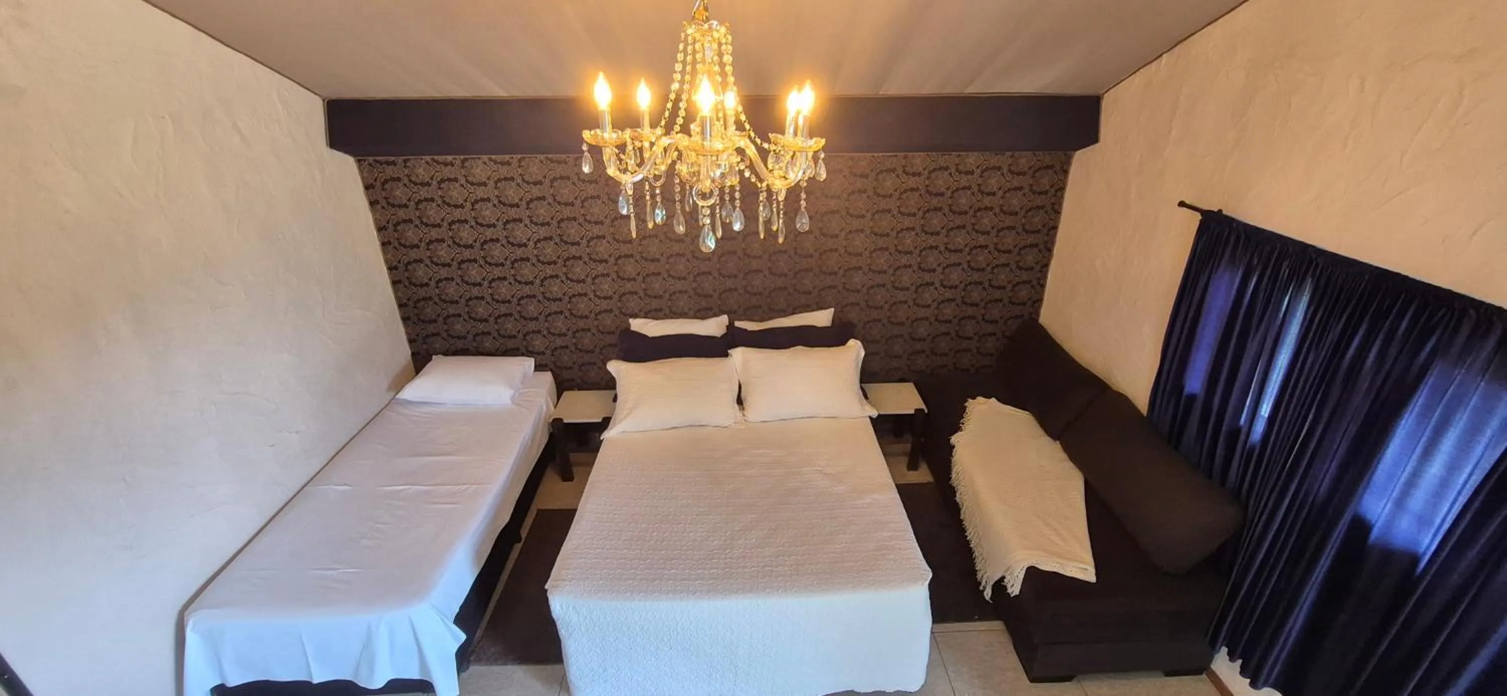Bed in Pousada Chalé da Montanha São Thomé das Letras