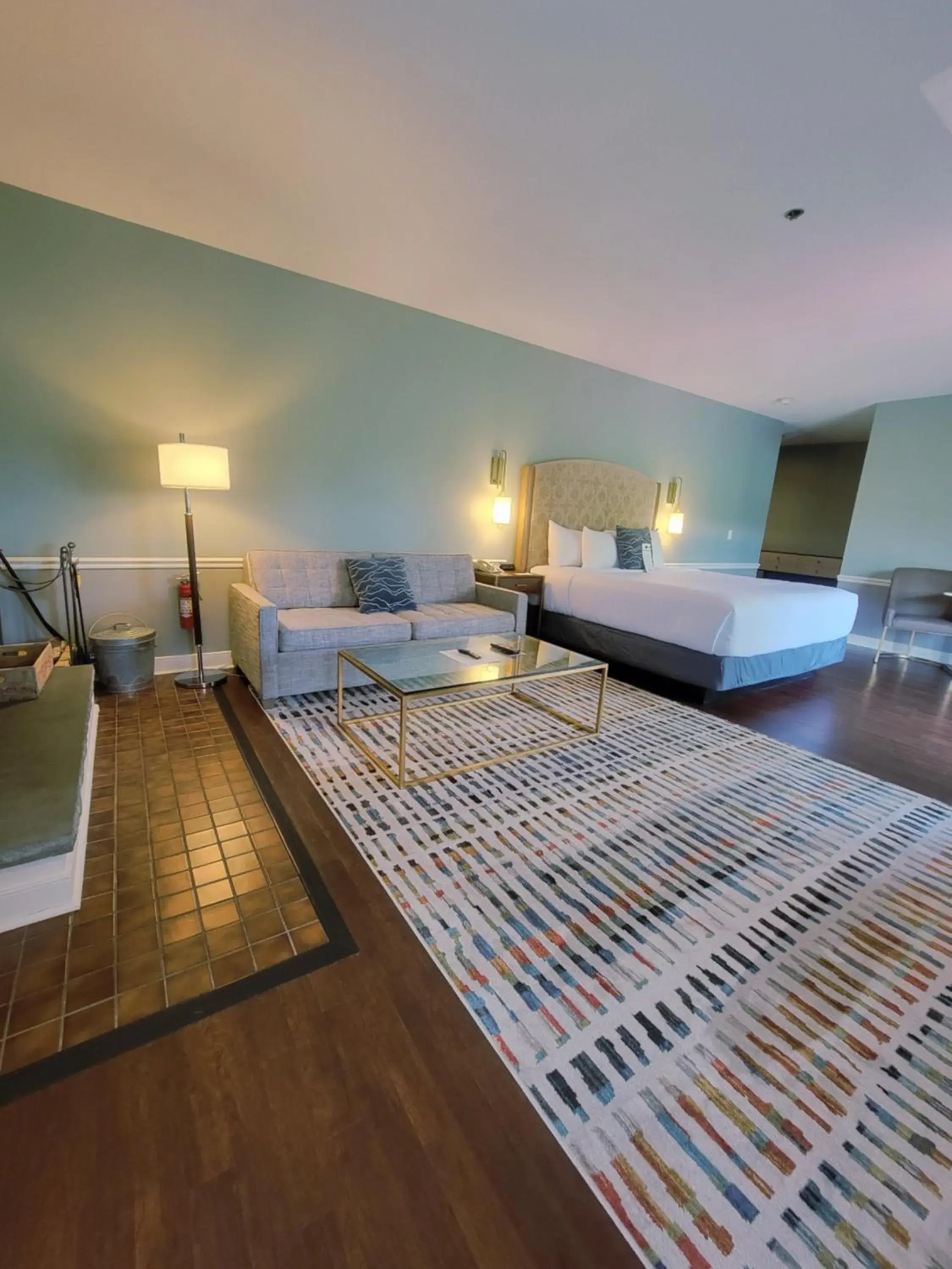 Seating area, Bed in La Tourelle Inn & Spa Seating area, Bed in La Tourelle Inn & Spa