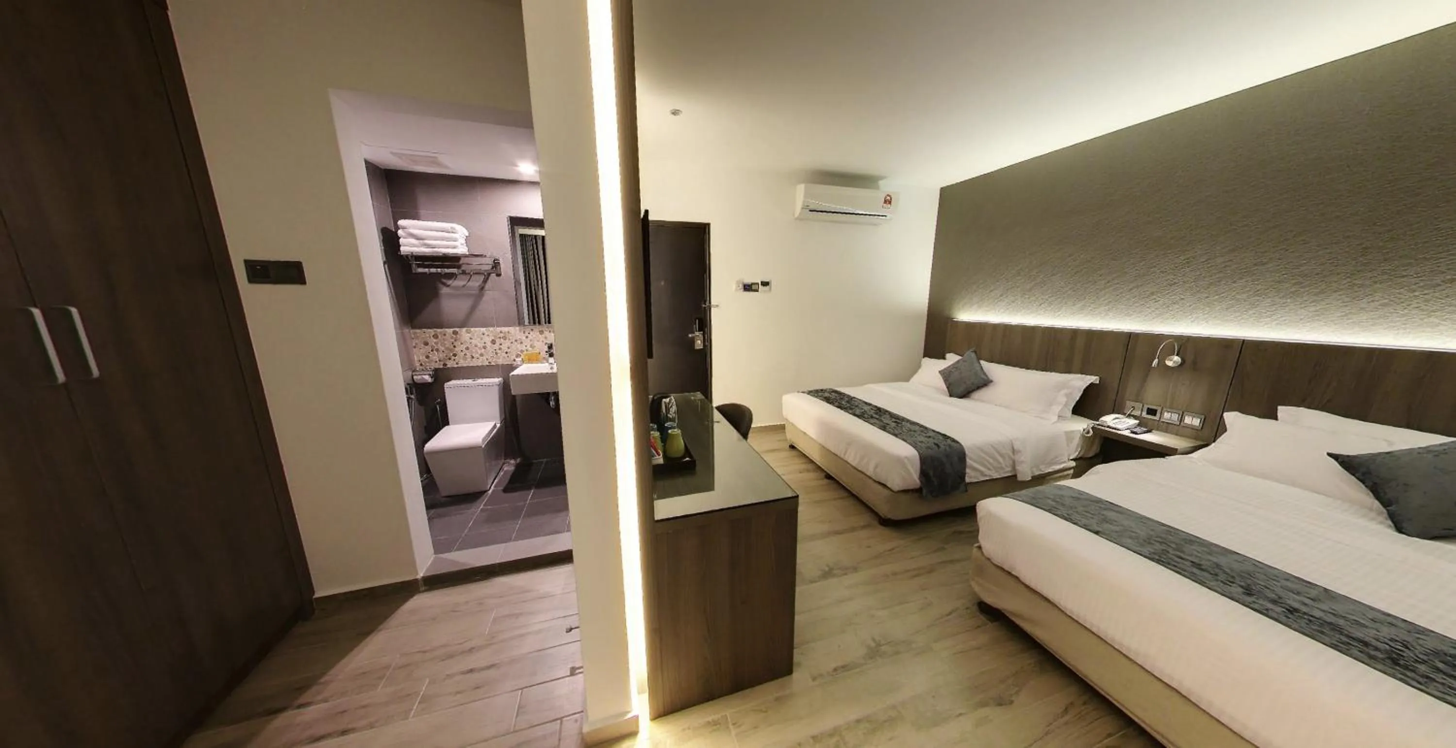 Bedroom in Flora by Crossroads Hotel