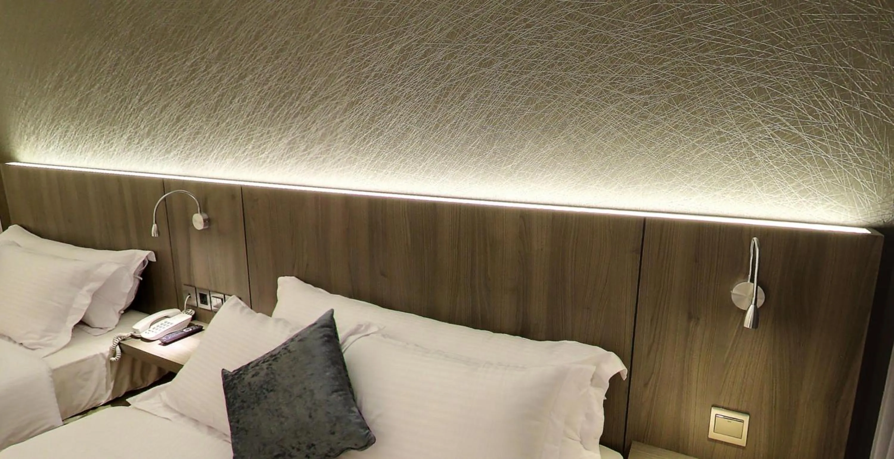 Bedroom in Flora by Crossroads Hotel