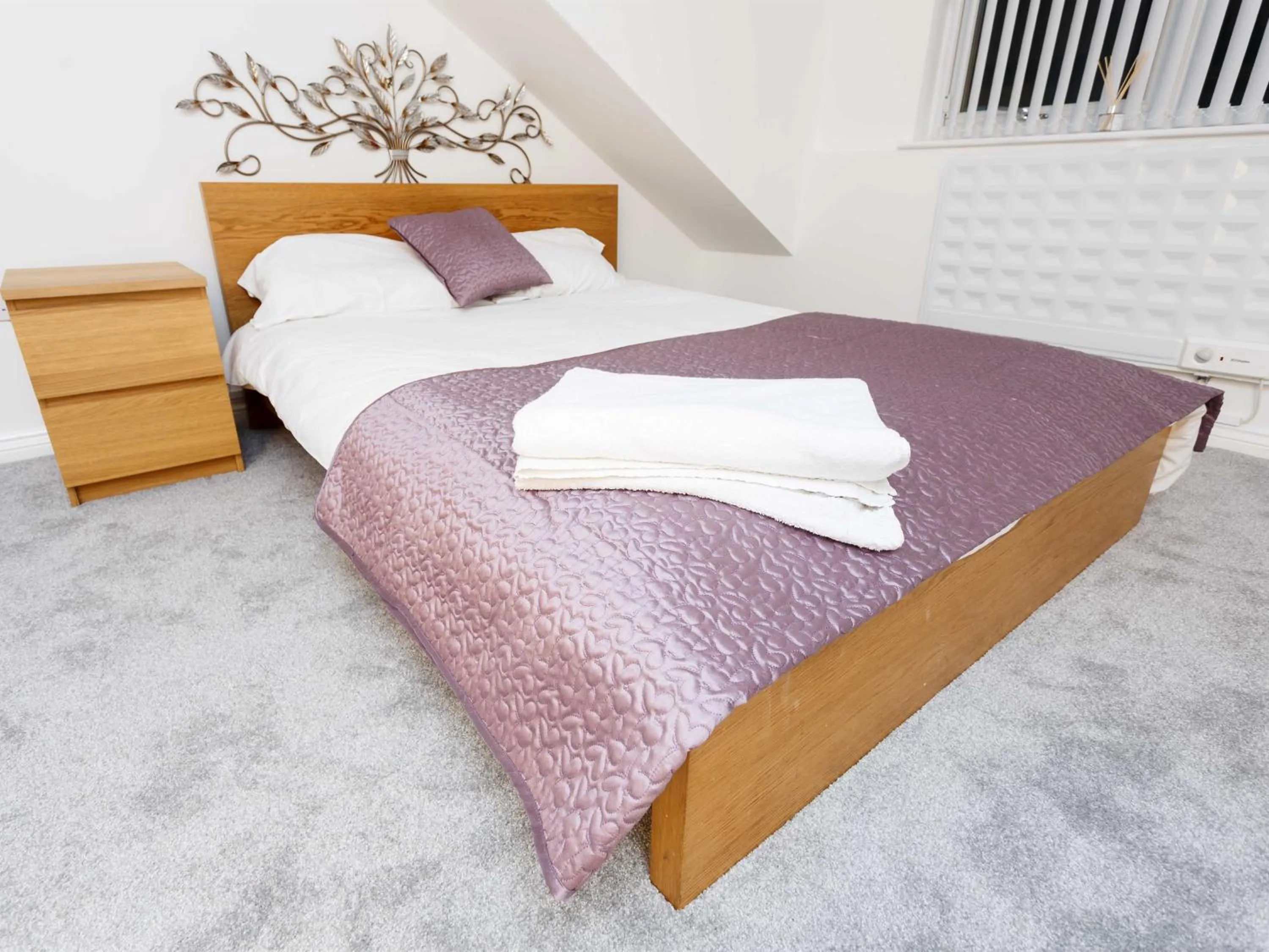 Bedroom in Ruth Apartments