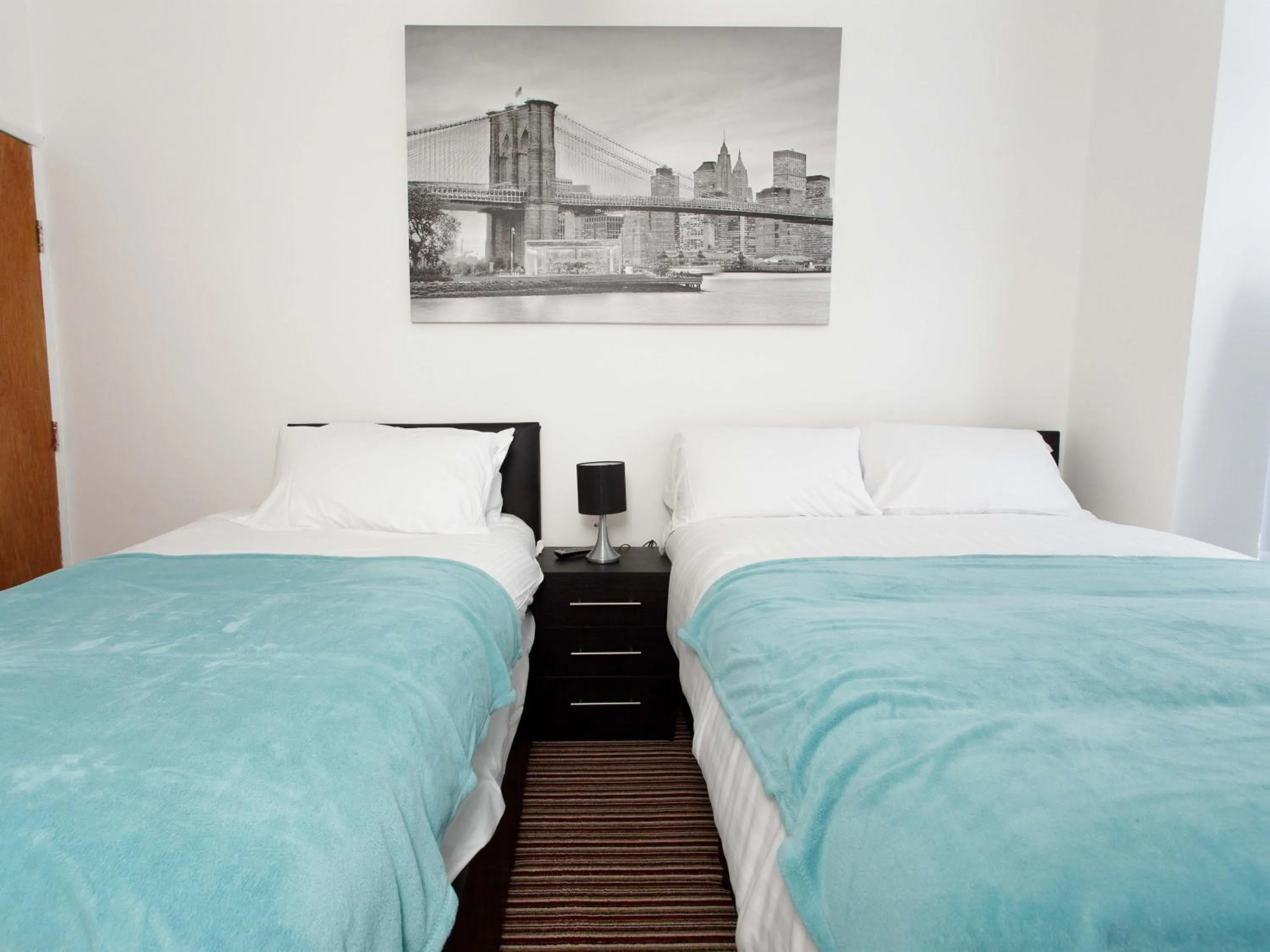 Bedroom in Ruth Apartments