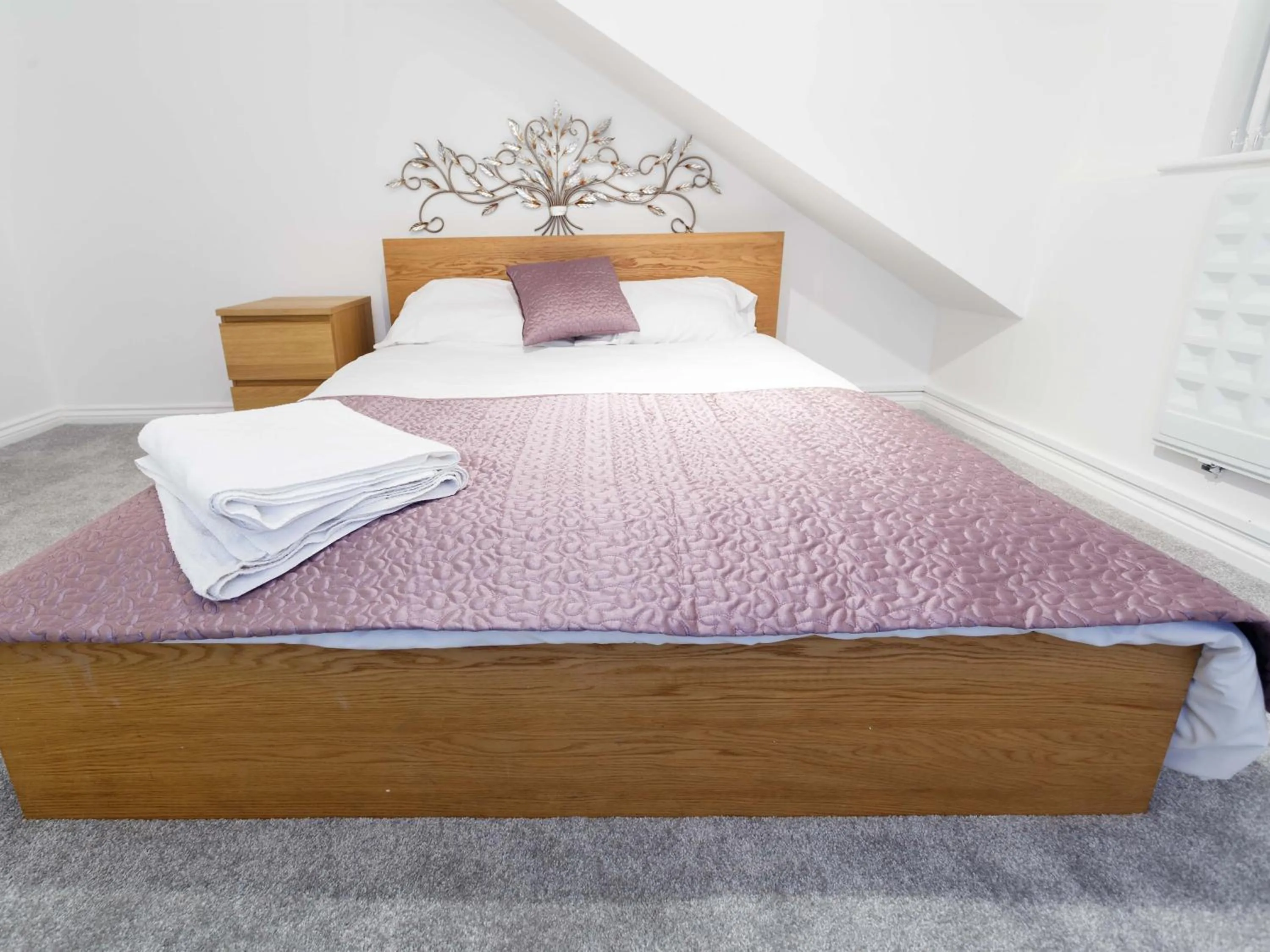 Bedroom in Ruth Apartments