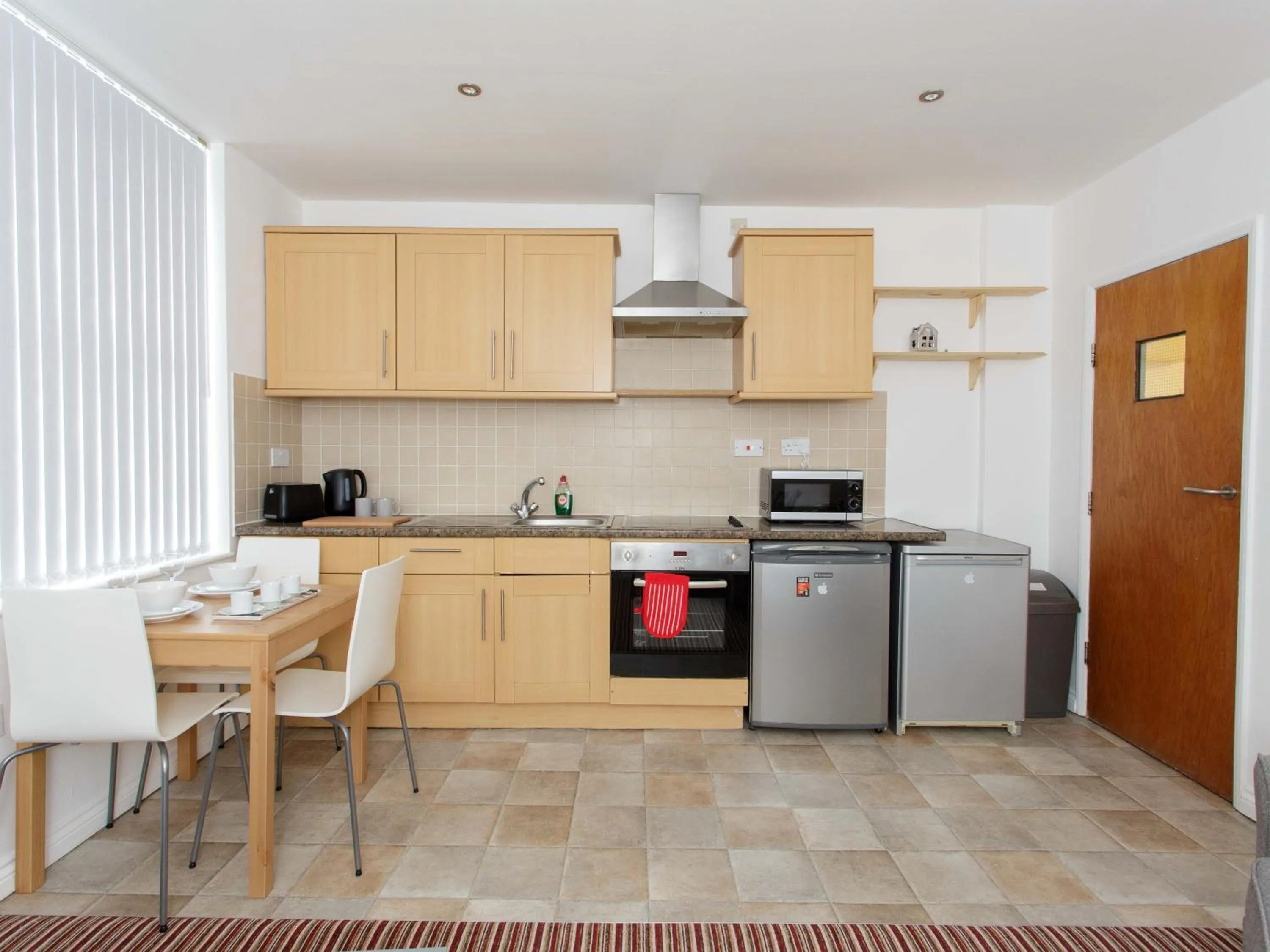 Kitchen or kitchenette in Ruth Apartments