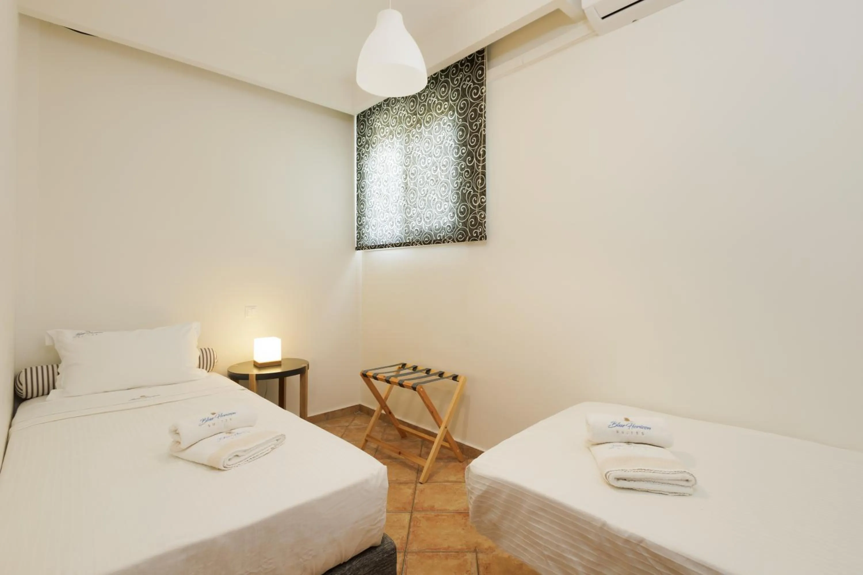 Bed in Blue Horizon Suites