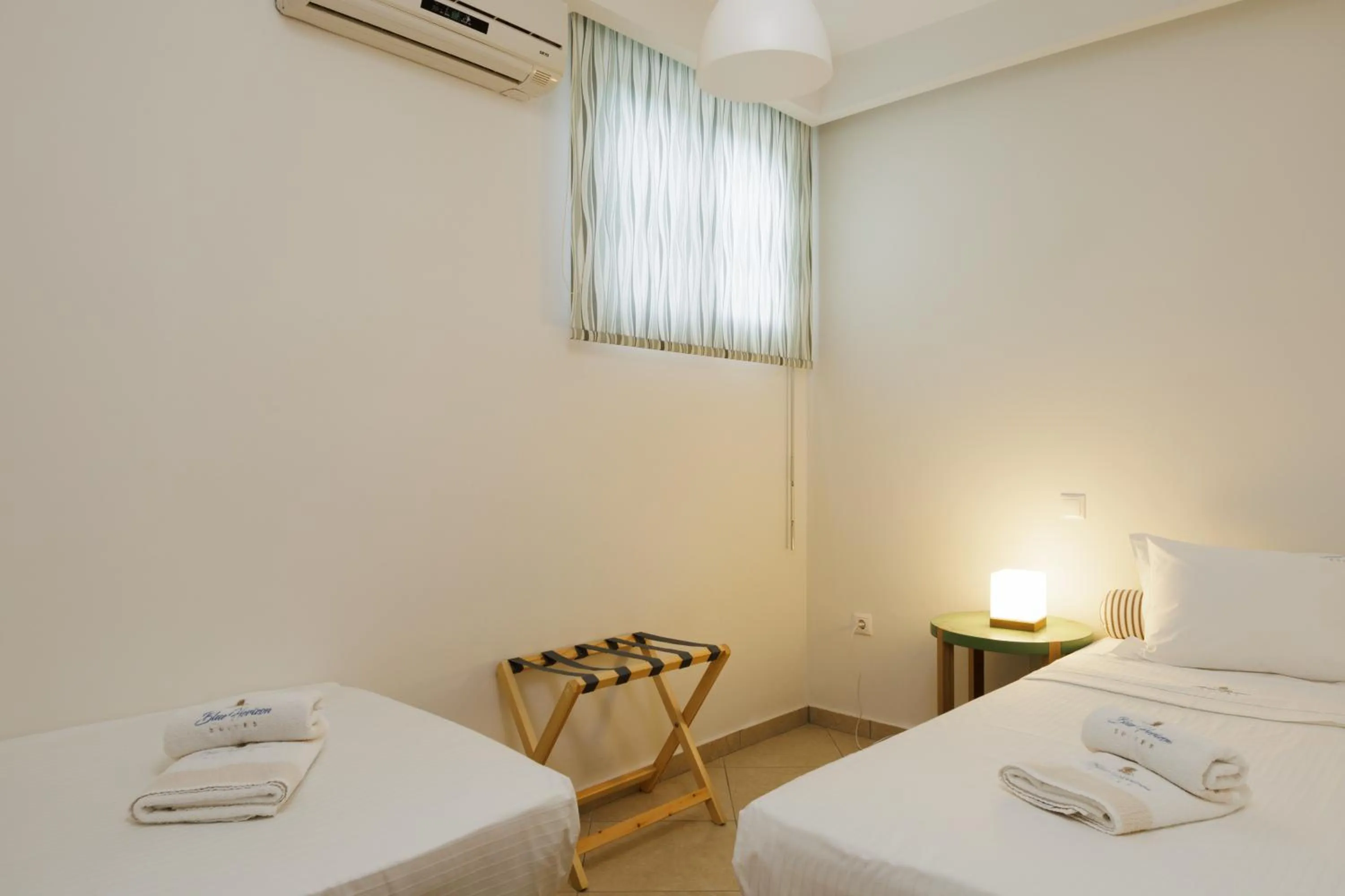 Bed in Blue Horizon Suites