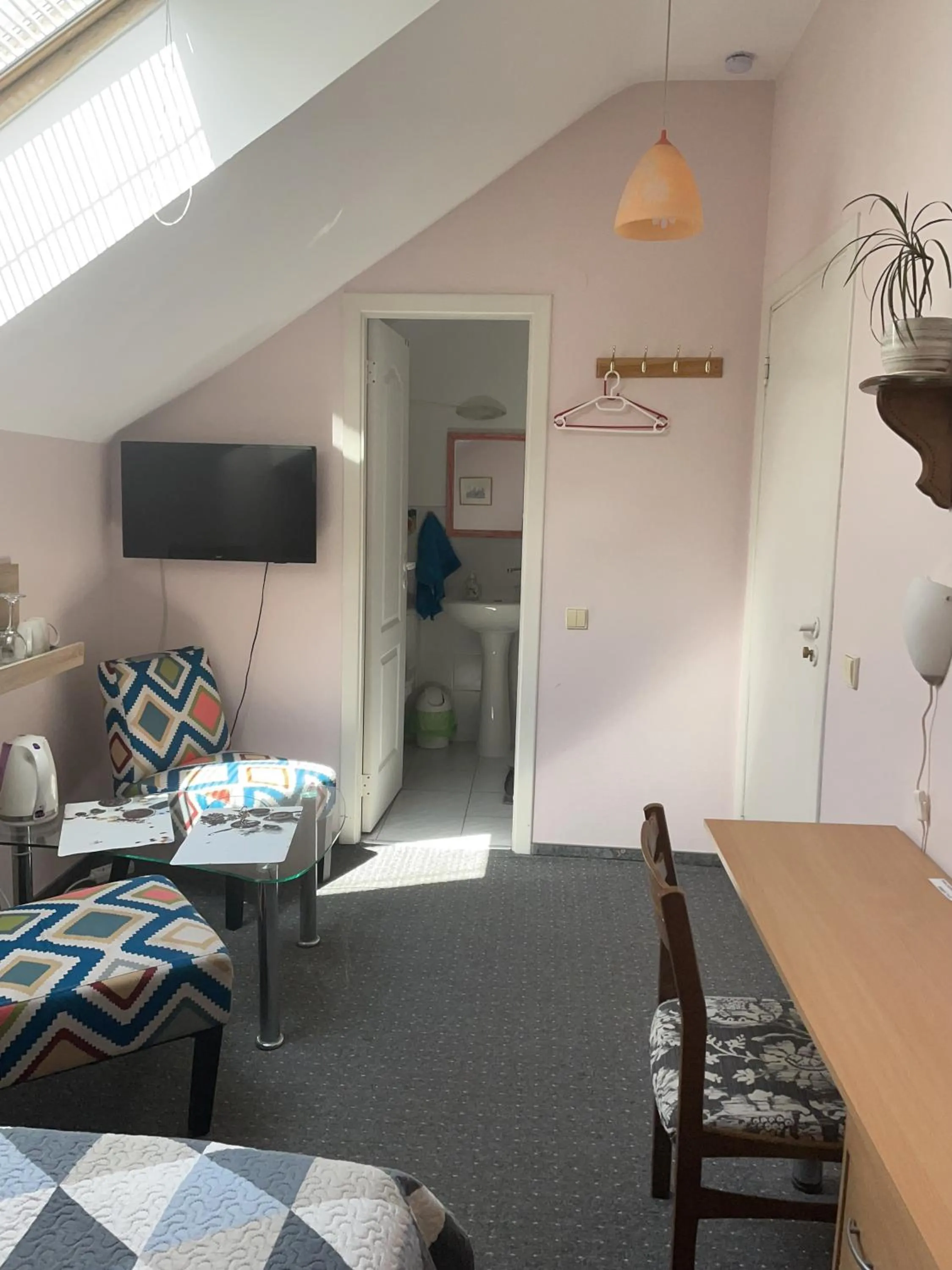 Seating area, Bed in Valentina's Rooms