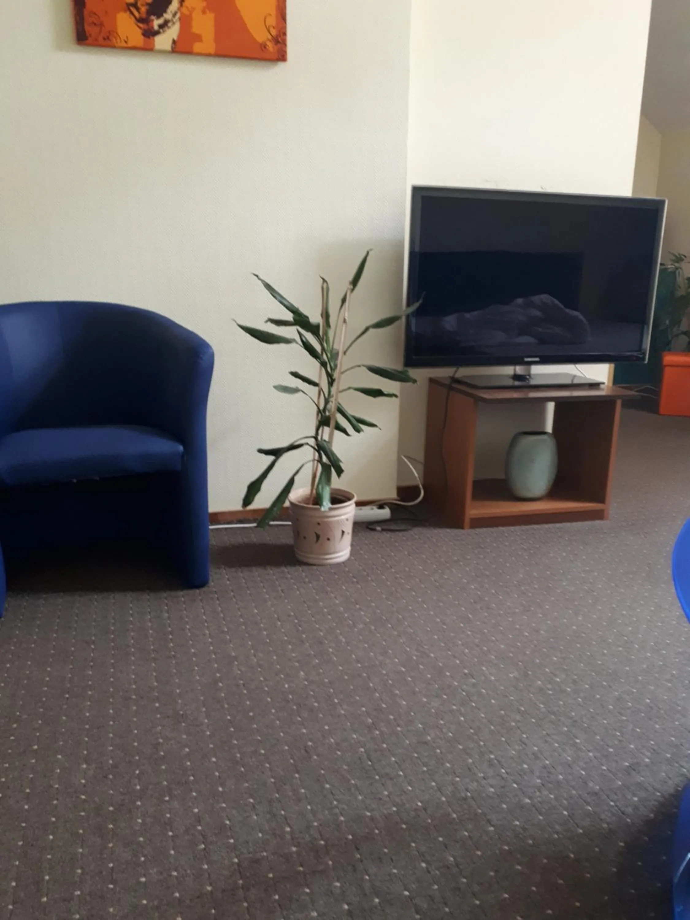 Communal lounge/ TV room in Valentina's Rooms