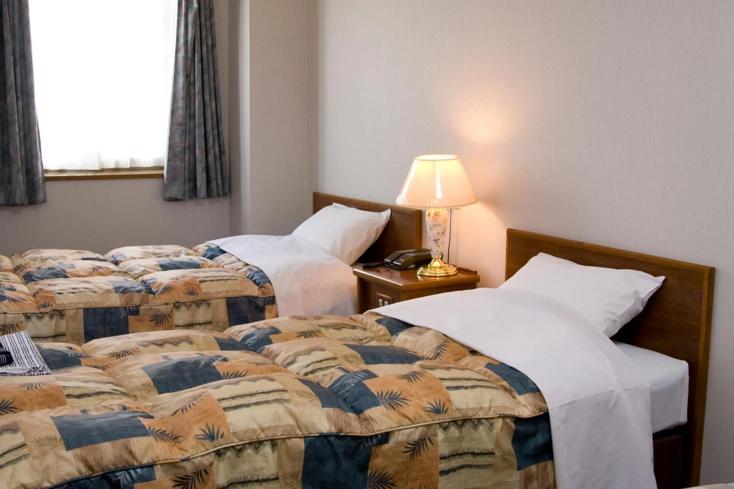 Bedroom, Bed in Shinseto Station Hotel