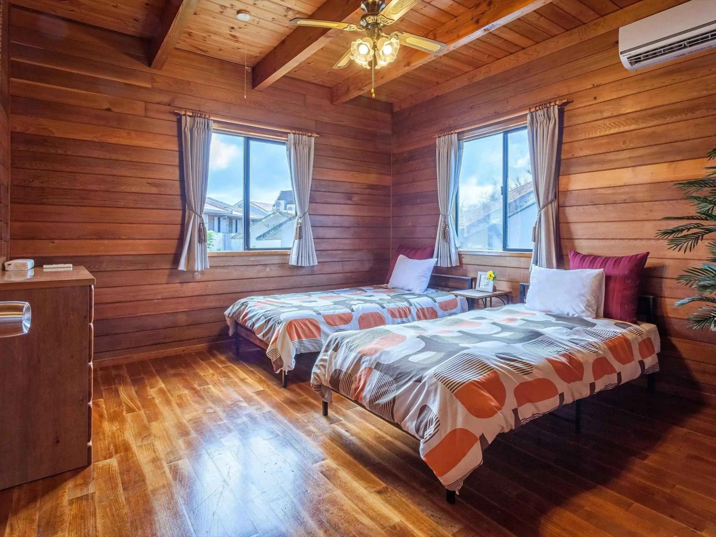 Photo of the whole room, Bed in Kariyushi Condominium Resort Yuudekiya Photo of the whole room, Bed in Kariyushi Condominium Resort Yuudekiya