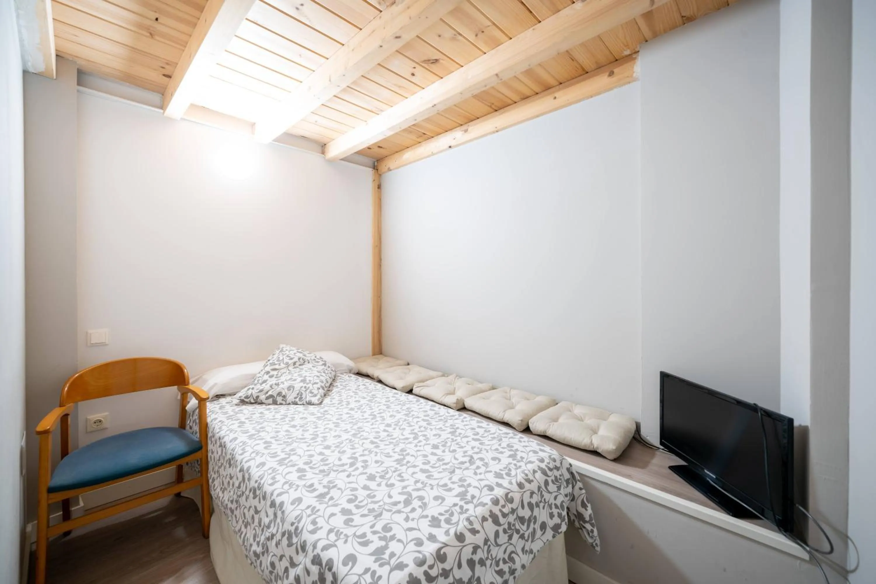 Bed in Apartamentos GO - Leopoldo Cano Center