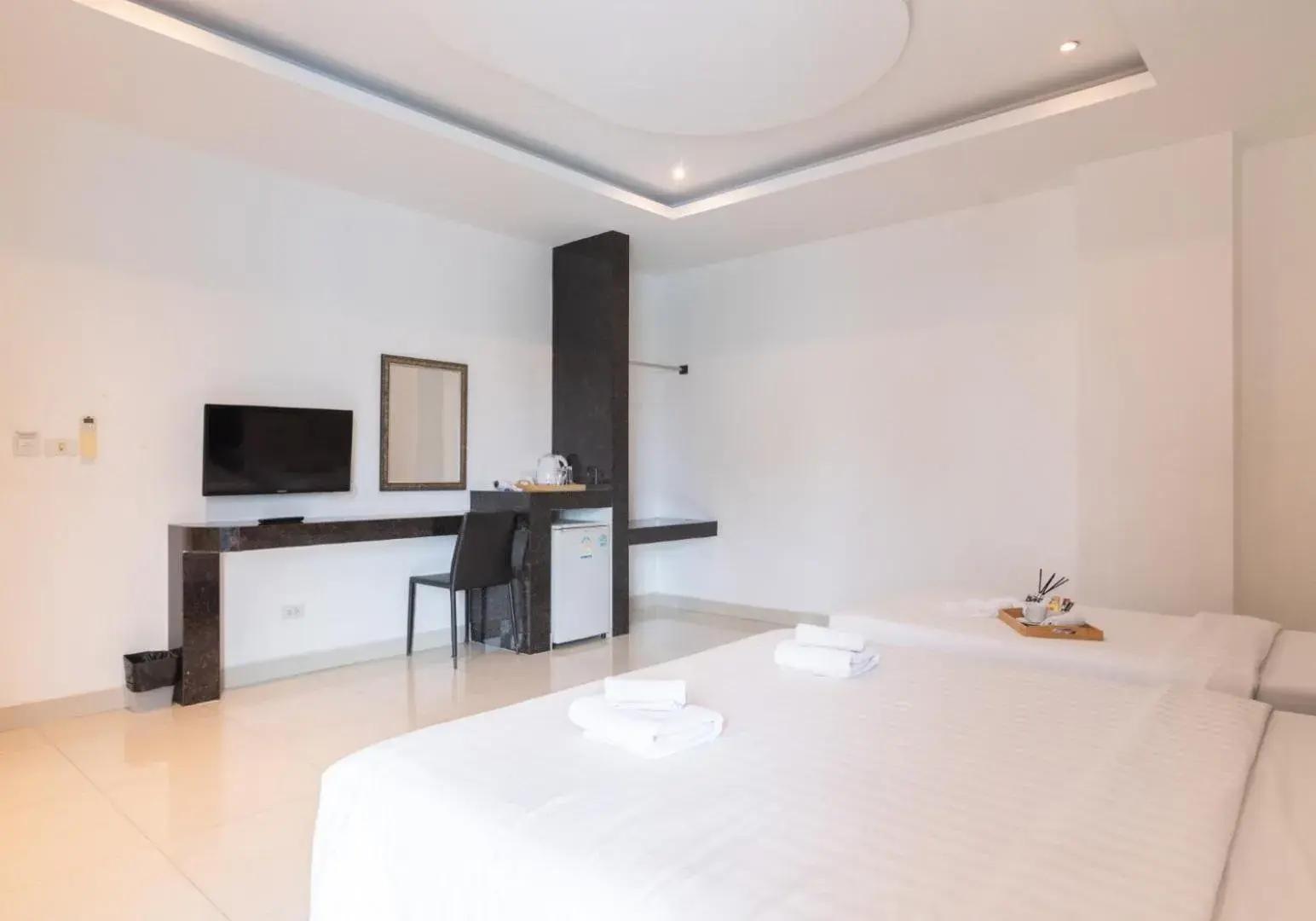 Bed, TV/Entertainment Center in Tribe Pattaya SHA certificated