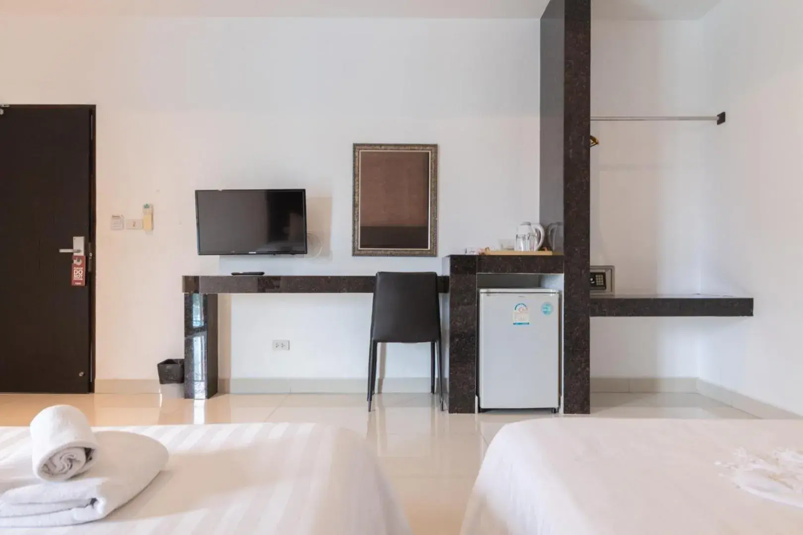 Bedroom, TV/Entertainment Center in Tribe Pattaya SHA certificated