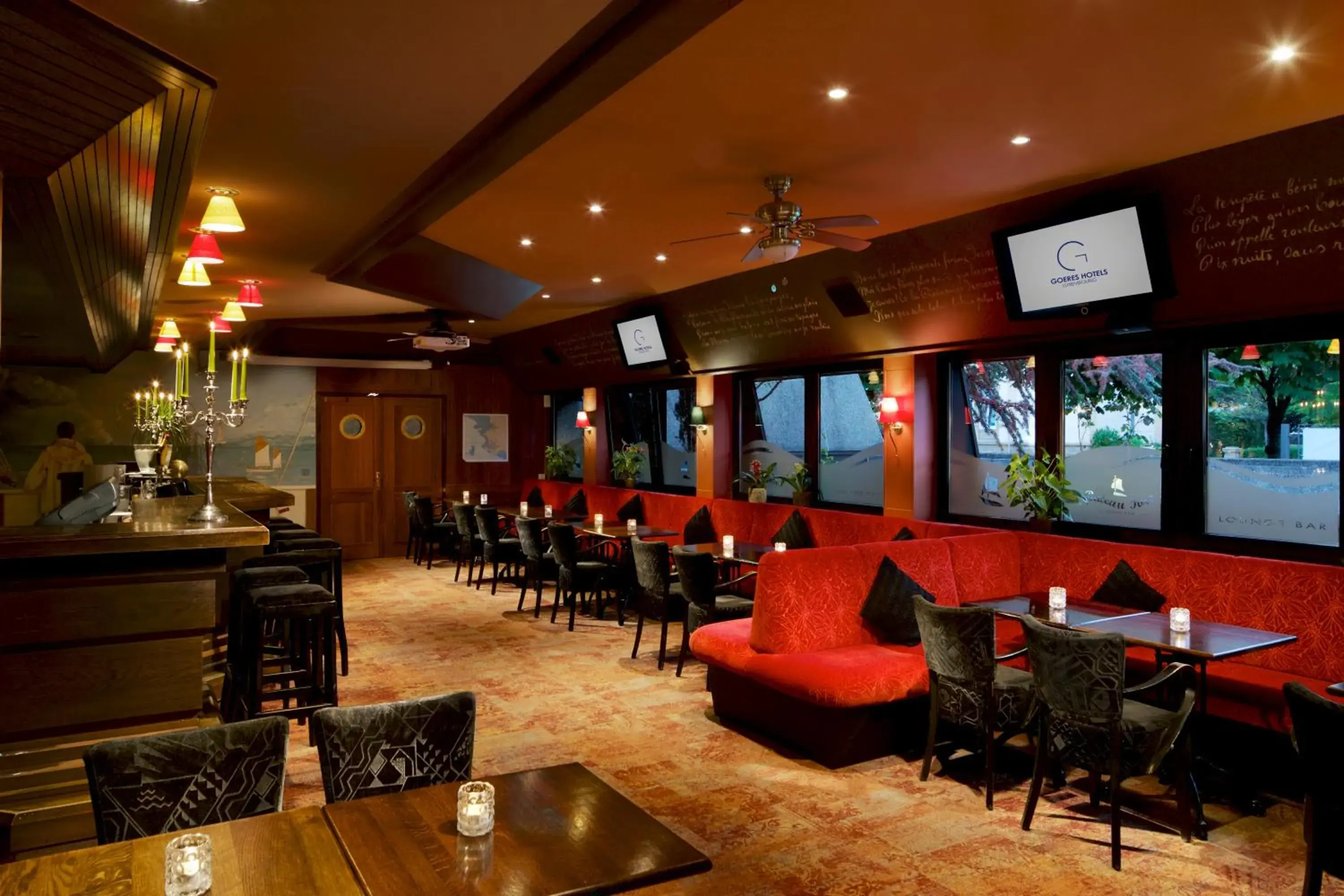 Lounge or bar in Hotel Parc Belle-Vue Lounge or bar in Hotel Parc Belle-Vue