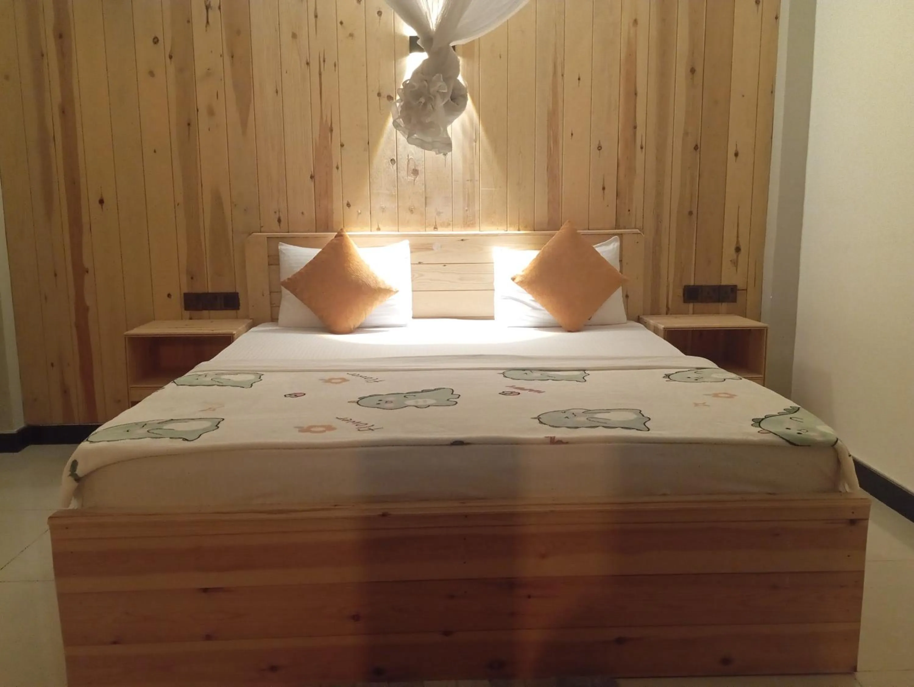 Bed in Dimuthu Home Stay