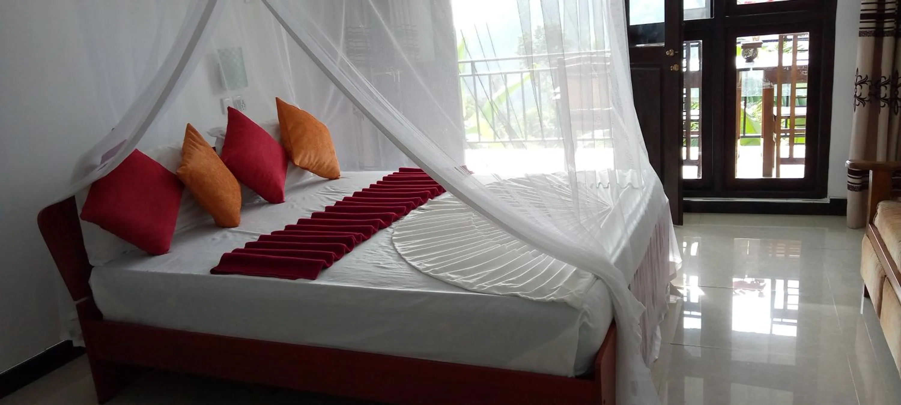 Bed in Dimuthu Home Stay