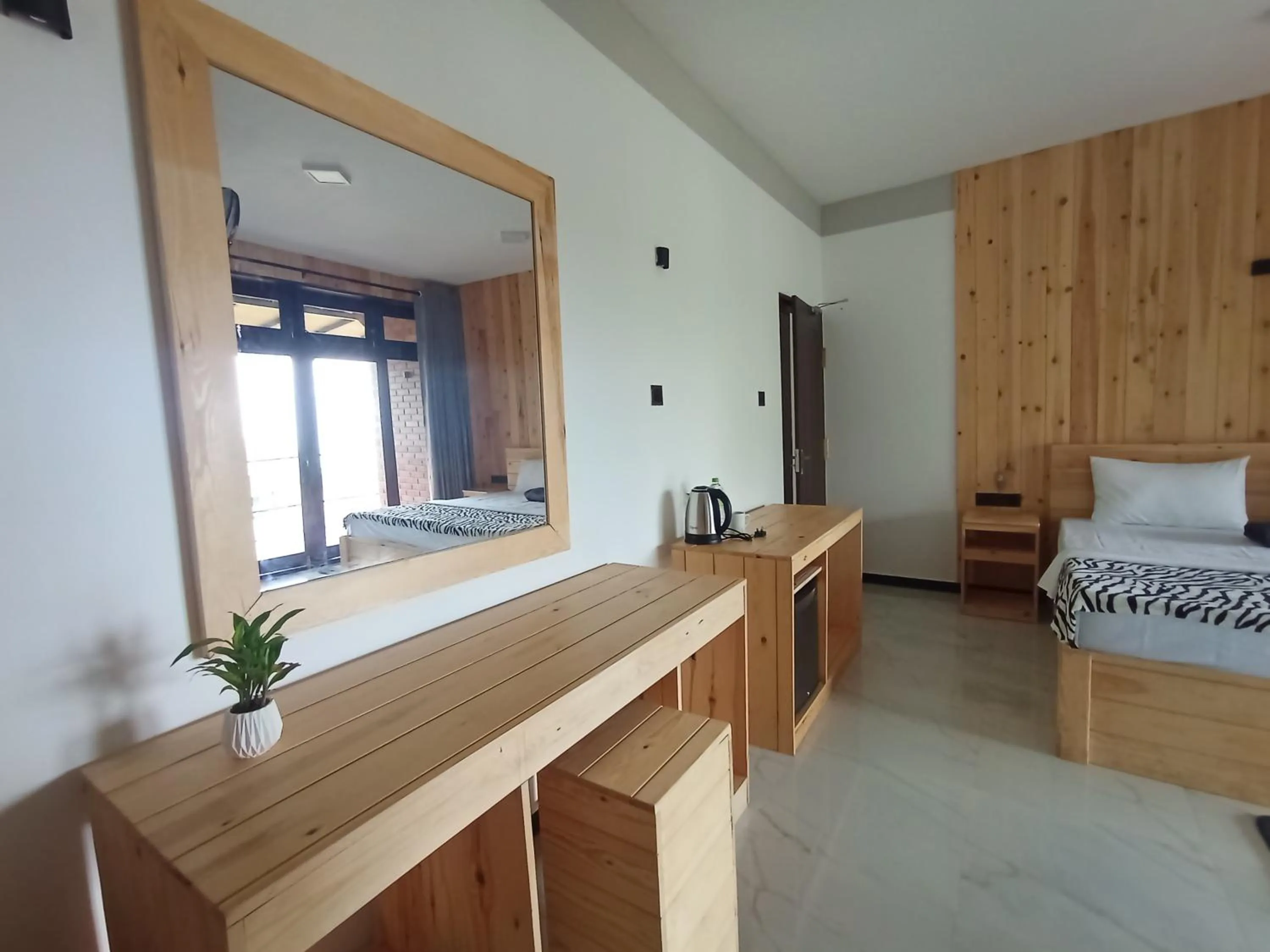 Bed in Dimuthu Home Stay