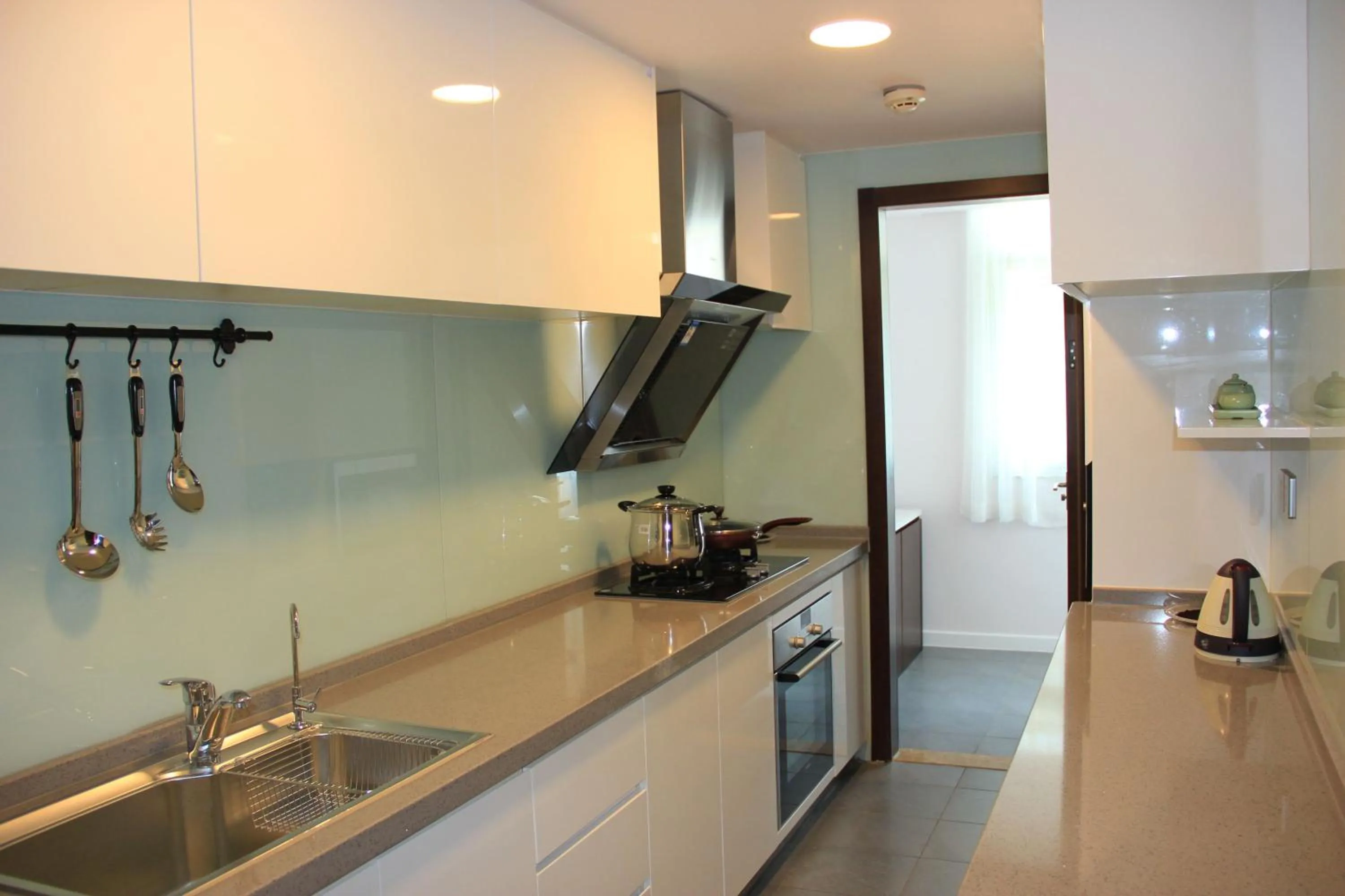 Kitchen or kitchenette in Green Park Hotel Tianjin