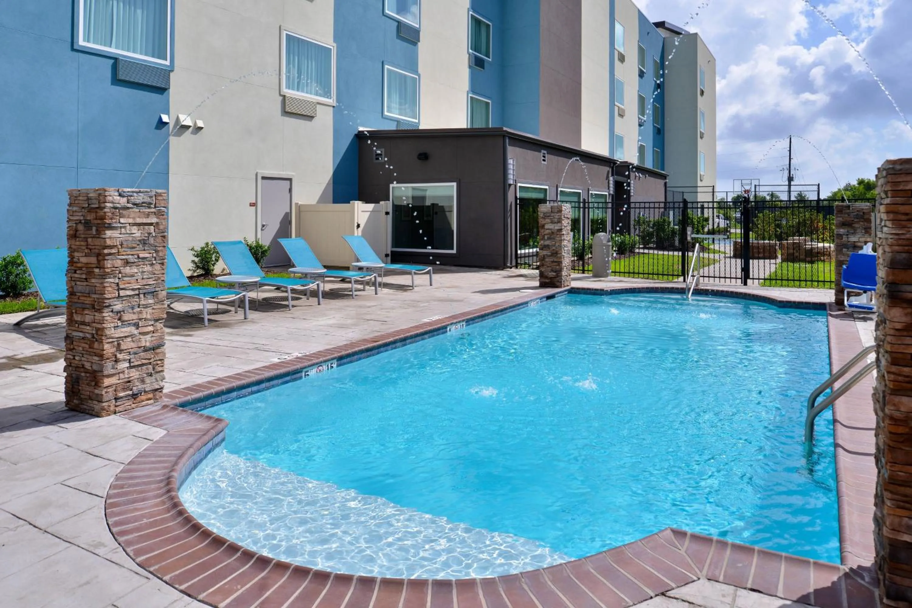 Swimming pool in TownePlace Suites by Marriott Laplace