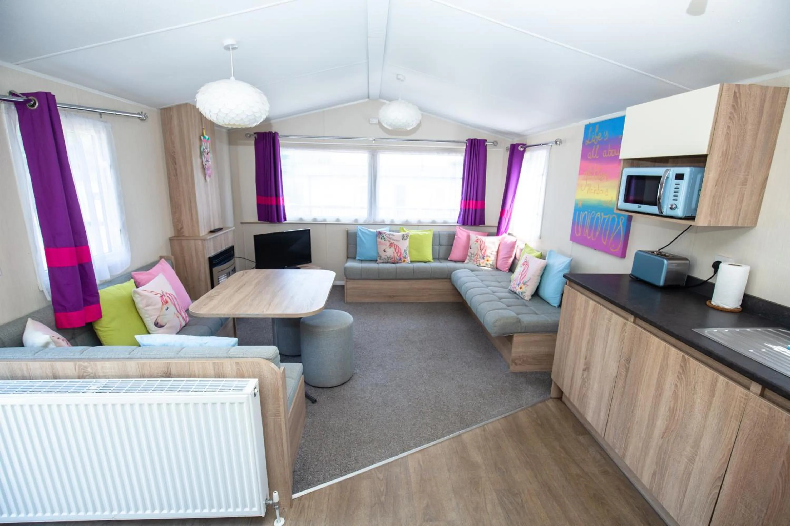 Communal lounge/ TV room in Adventurer's Village Milton Keynes