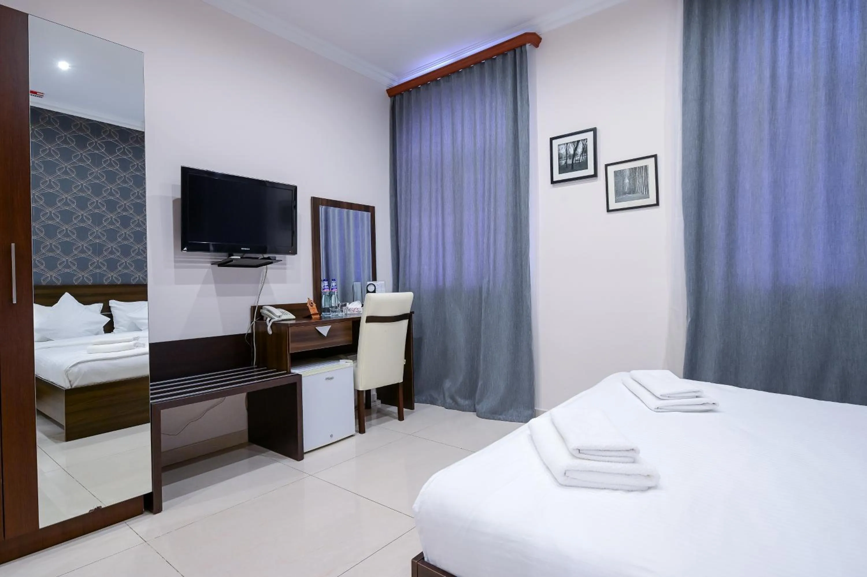 Bed in Mia Casa Hotel Yerevan