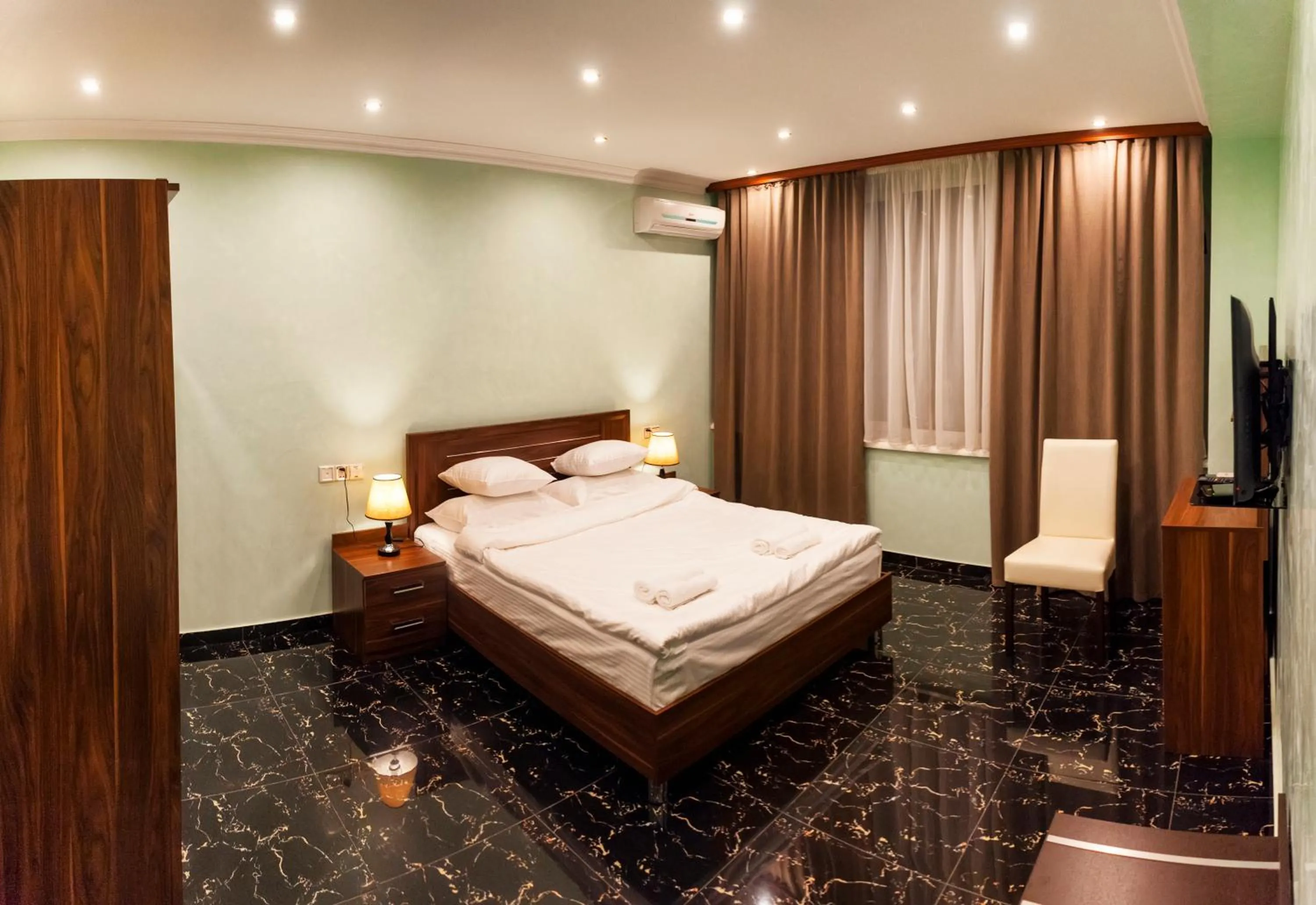 Bed in Mia Casa Hotel Yerevan