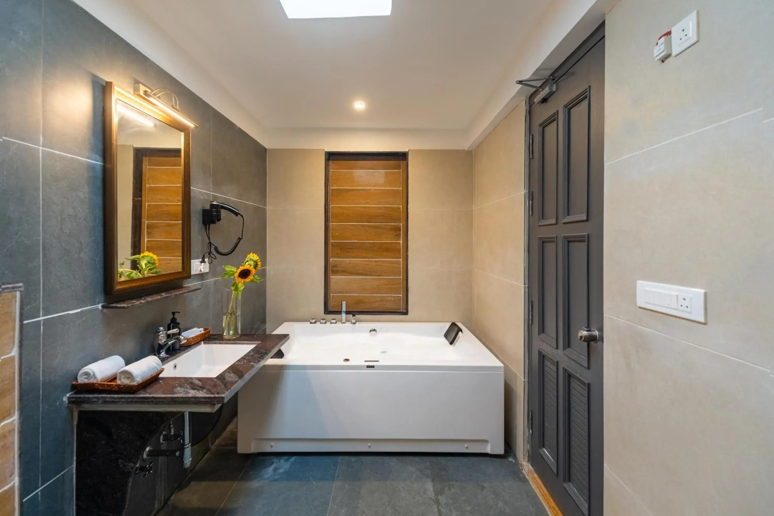 Hill View Jacuzzi Suite With Balcony in Anandam - A Luxury Resort in Udaipur Hill View Jacuzzi Suite With Balcony in Anandam - A Luxury Resort in Udaipur