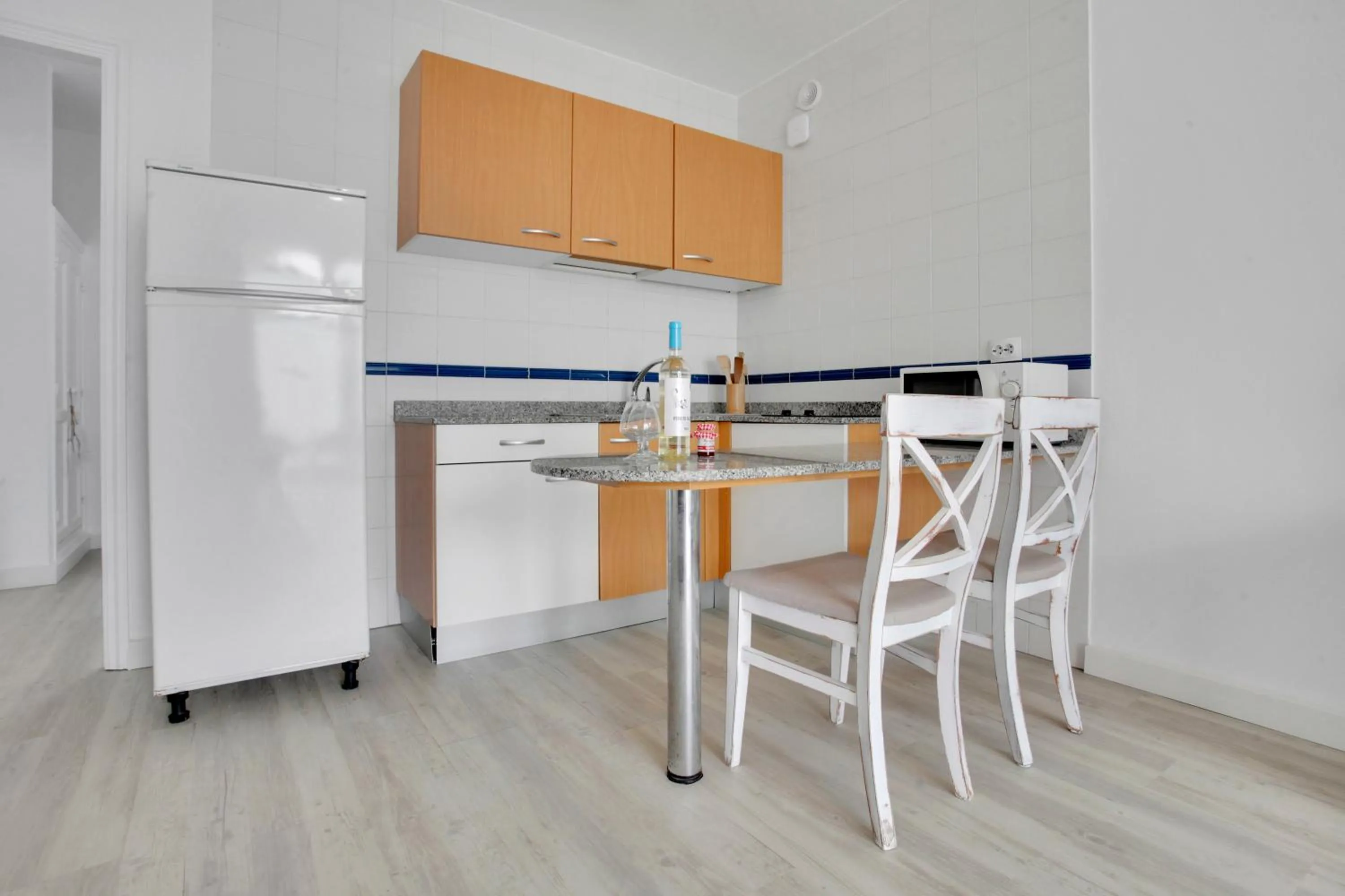 Kitchen or kitchenette in Neptuno Bungalows - Adults Only