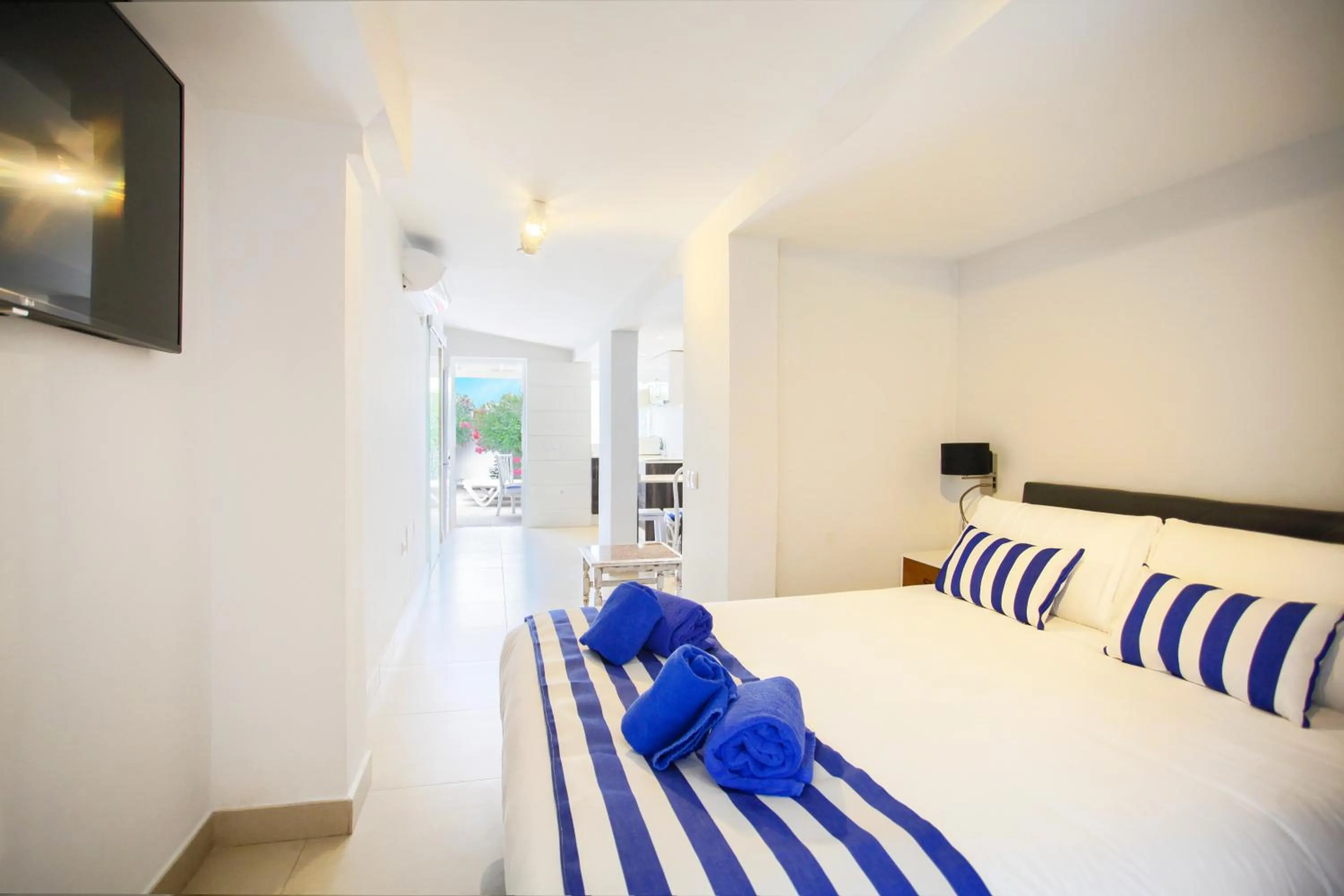 Bed in Neptuno Bungalows - Adults Only