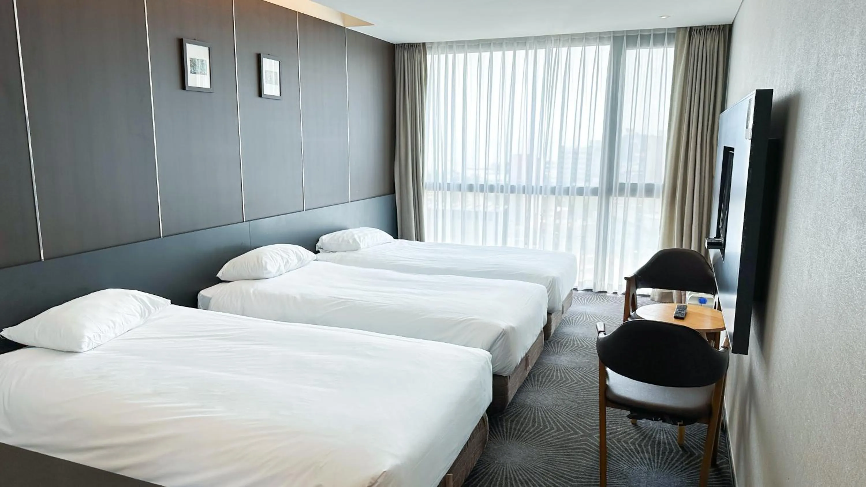 Bed in Golden Daisy Hotel