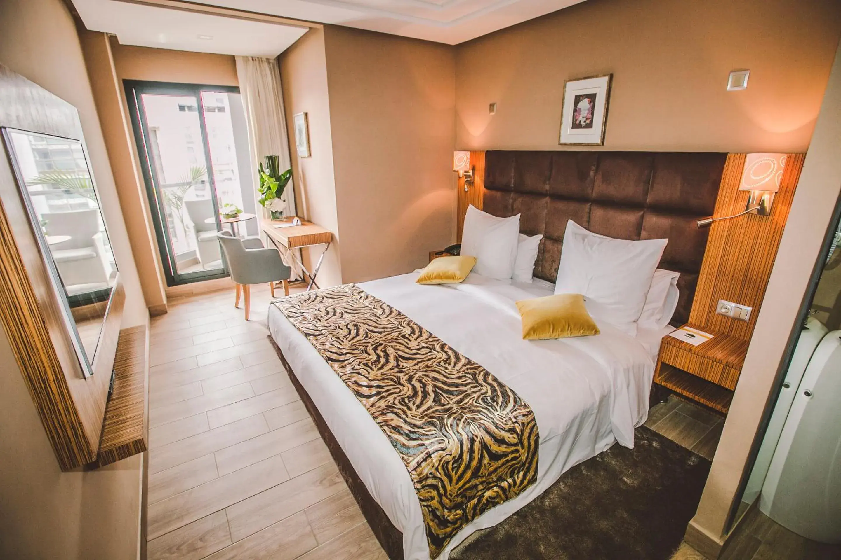 Balcony/Terrace, Bed in Hôtel Down Town Maarif Balcony/Terrace, Bed in Hôtel Down Town Maarif