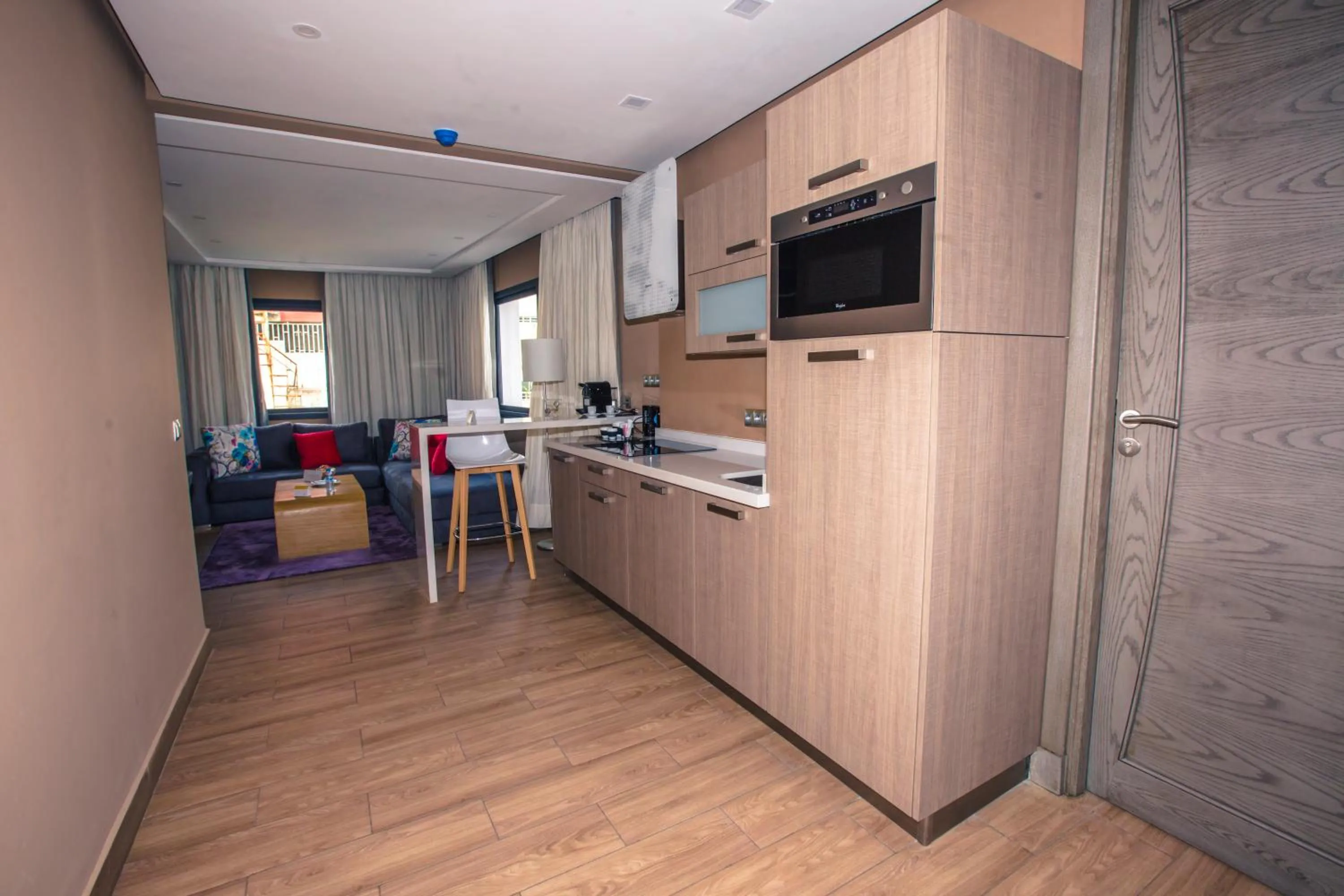 Communal lounge/ TV room in Hôtel Down Town Maarif