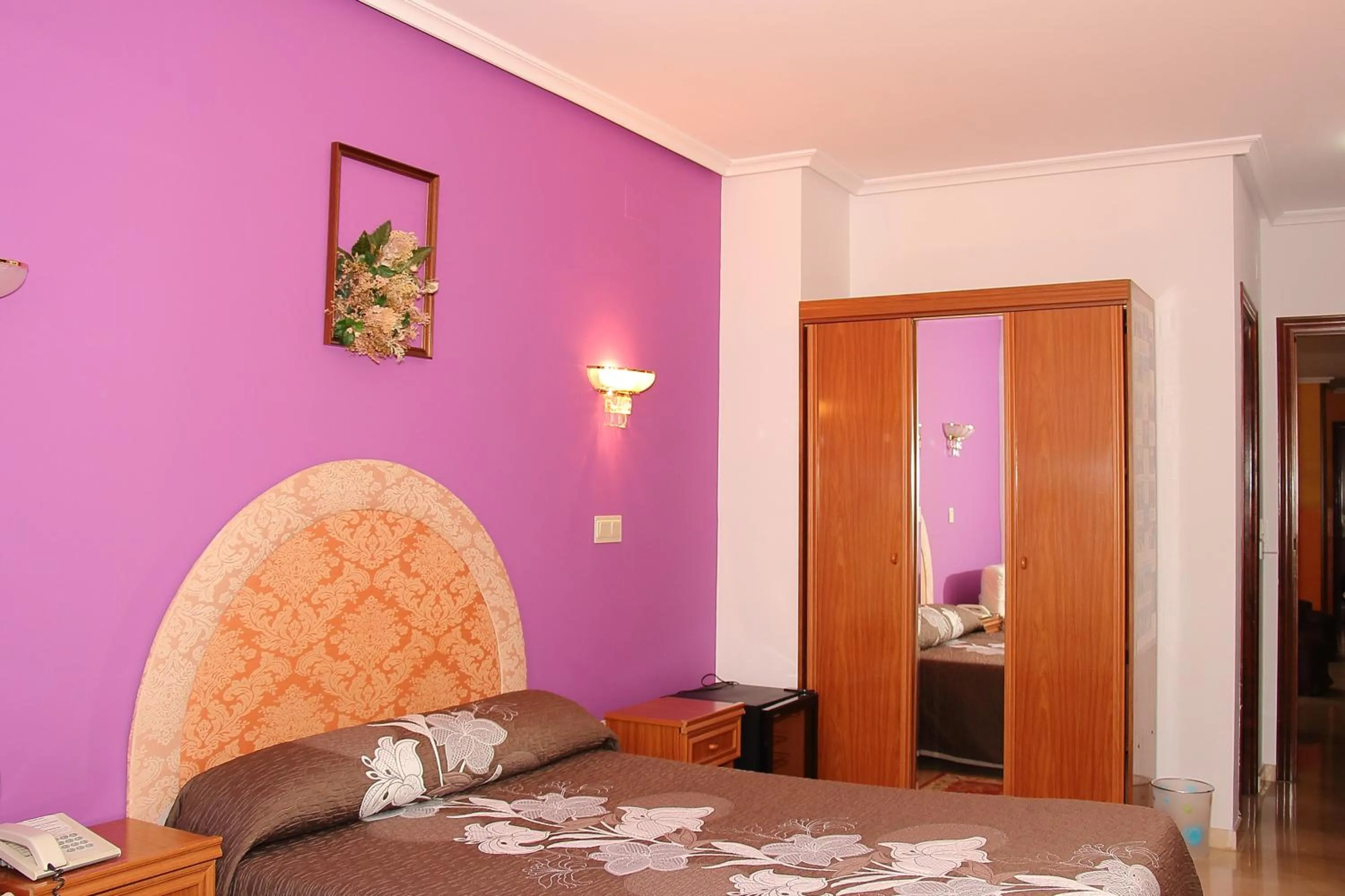 Property building, Bed in Hotel Avenida III