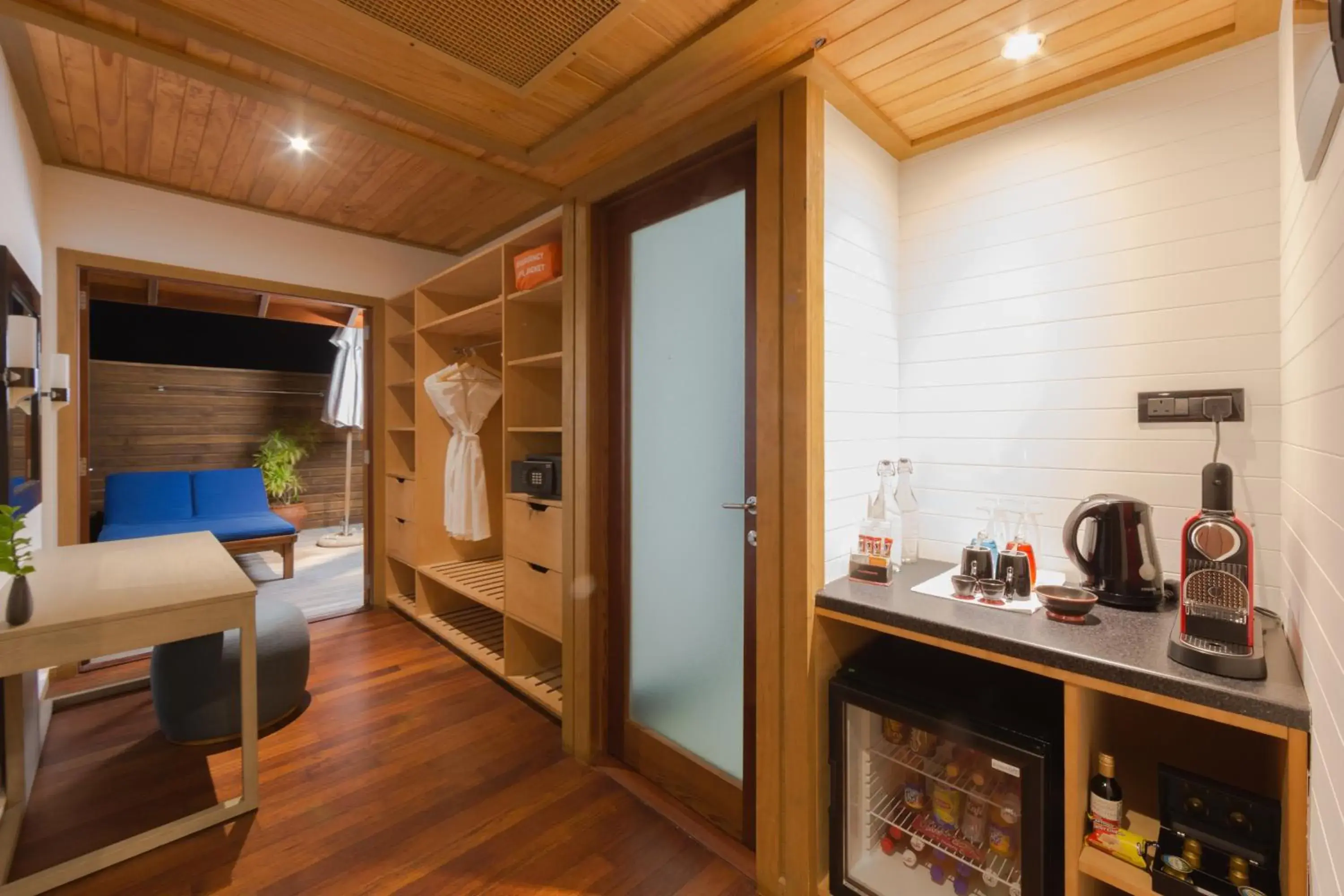 Coffee/tea facilities, Bed in Vilamendhoo Island Resort & Spa Coffee/tea facilities, Bed in Vilamendhoo Island Resort & Spa
